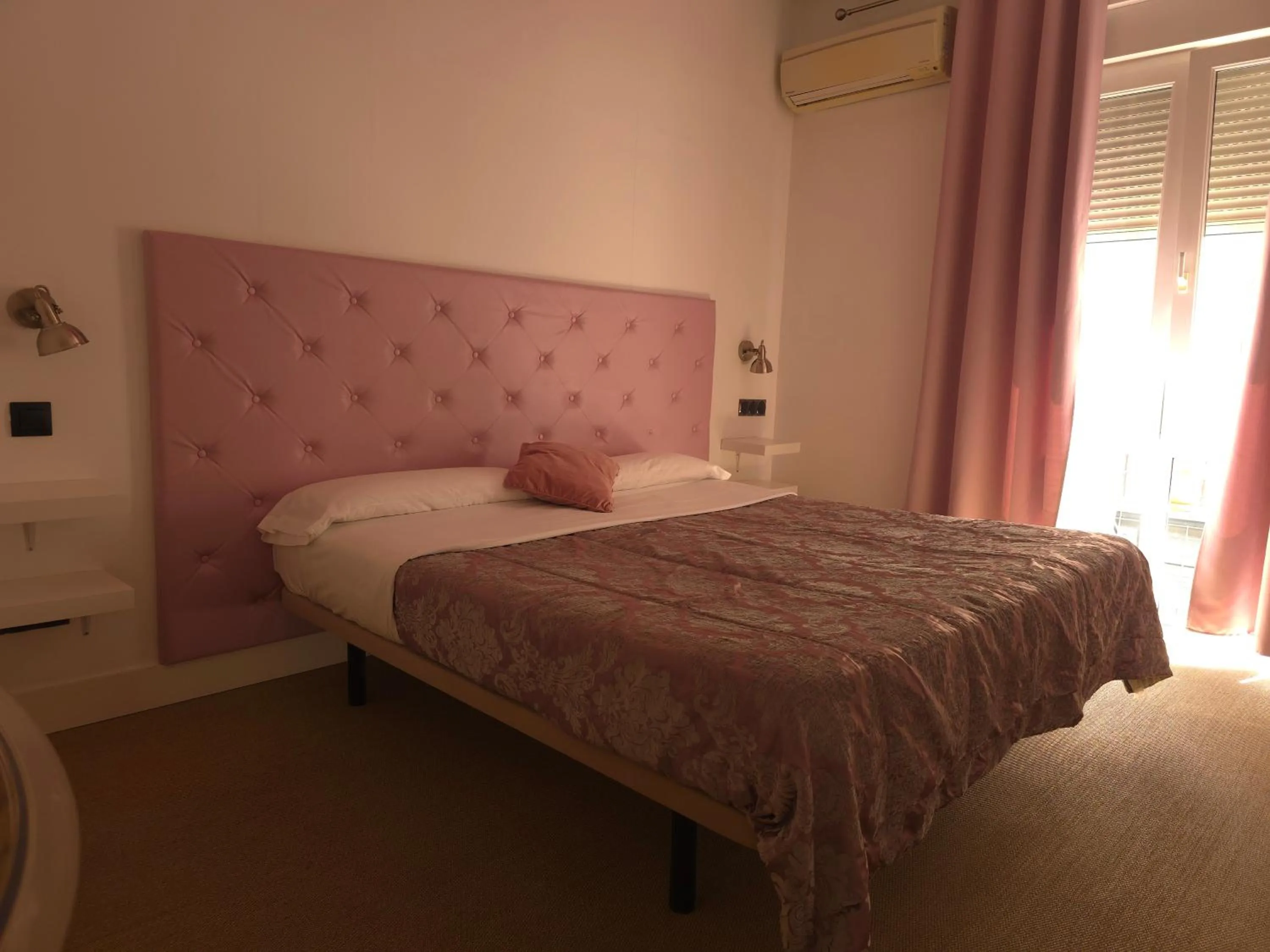 Bed in Hostal Santa Ana Colors