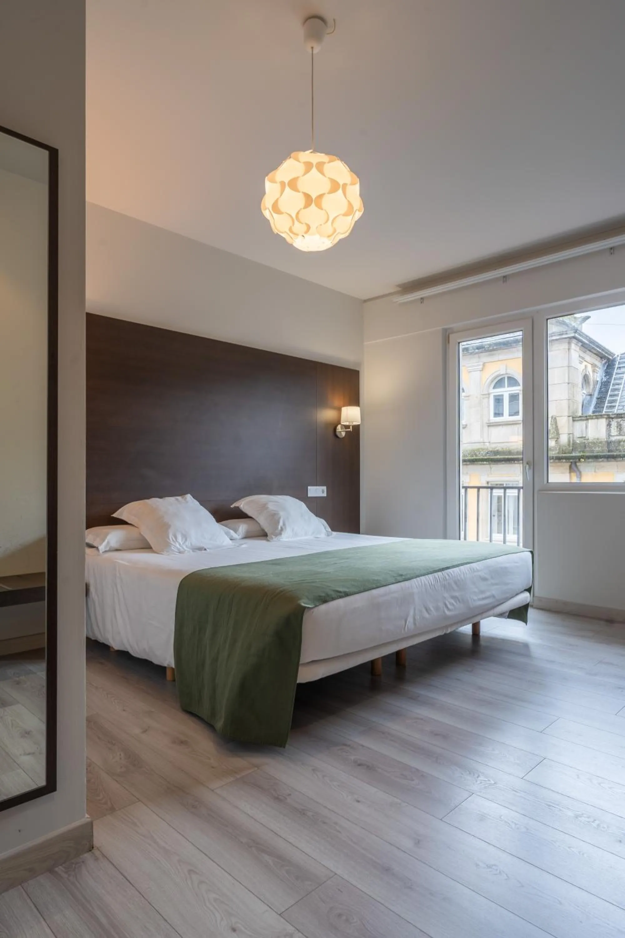 Bed in Hotel Mendez Nuñez