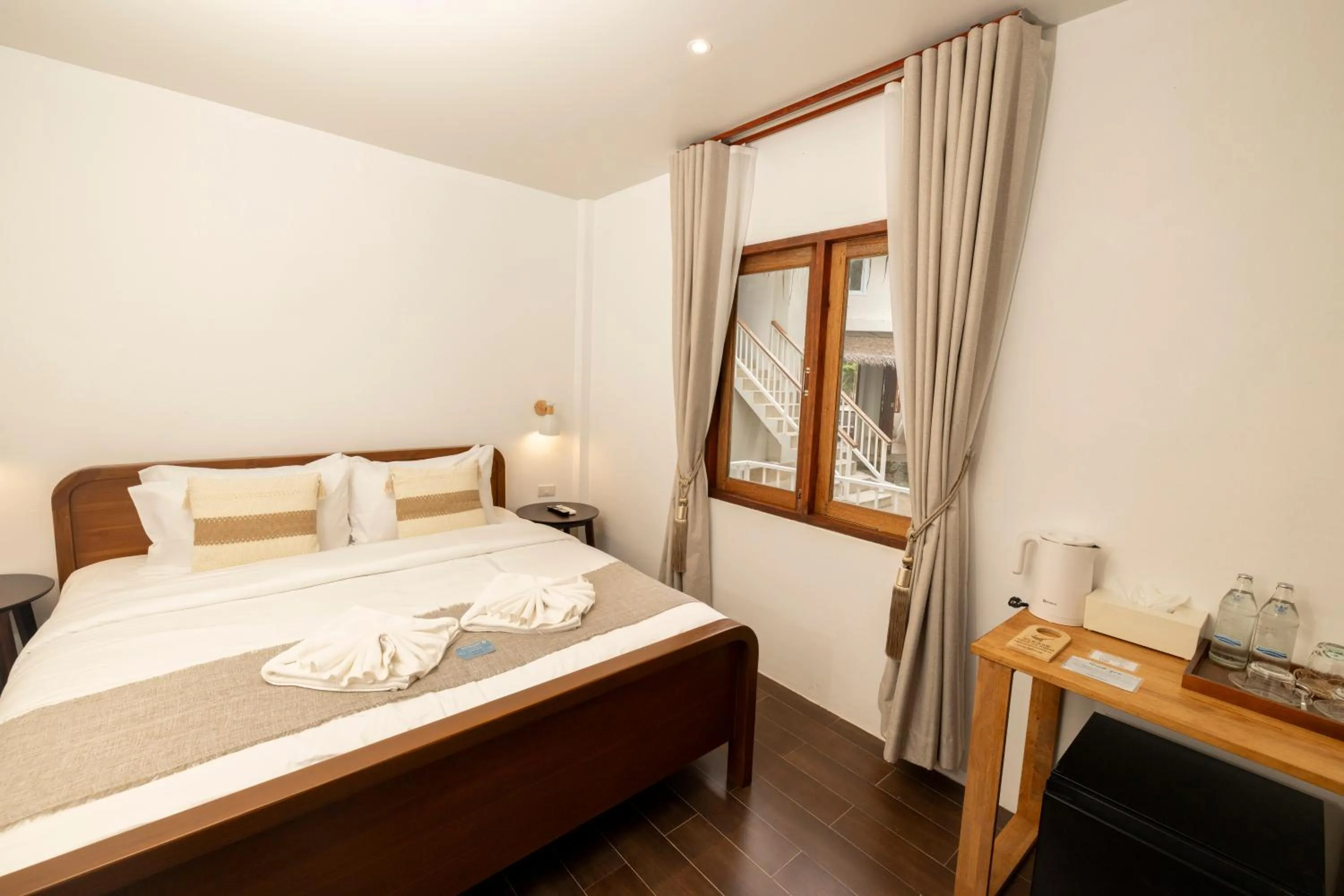 Bed in The AVA Resort Koh Tao