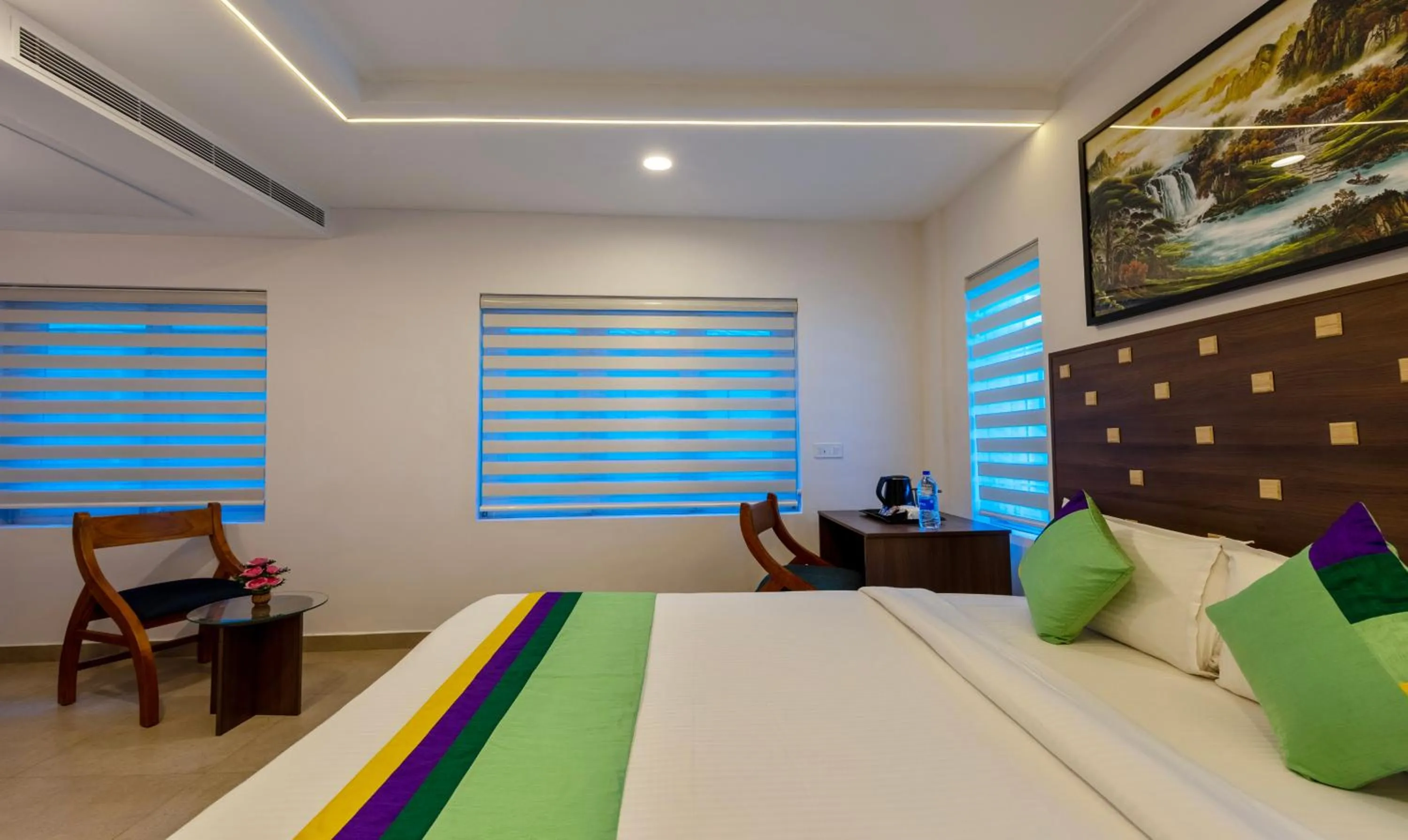 Bed in Treebo vSaffron Regency, Punnamada Lake