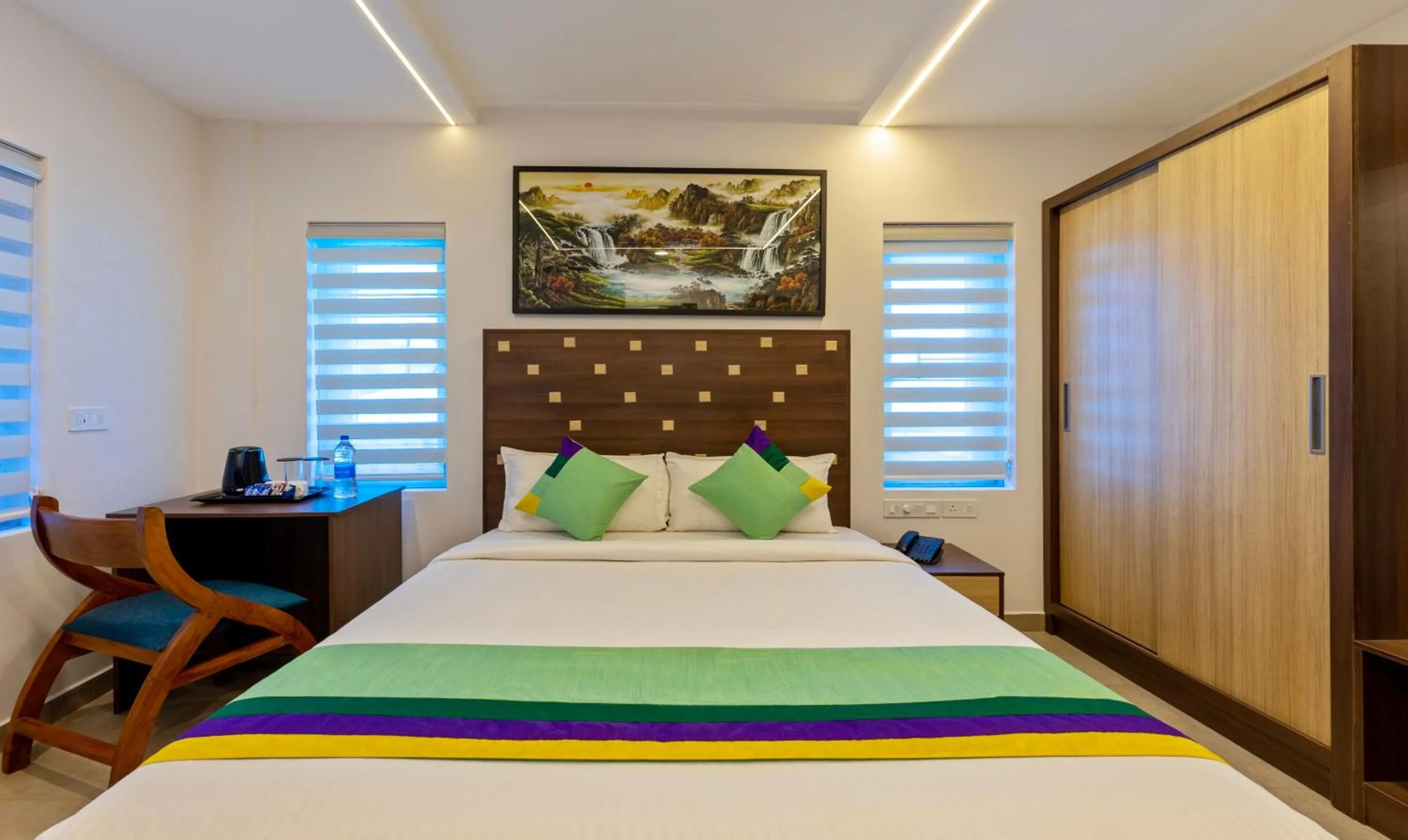 Bed in Treebo vSaffron Regency, Punnamada Lake