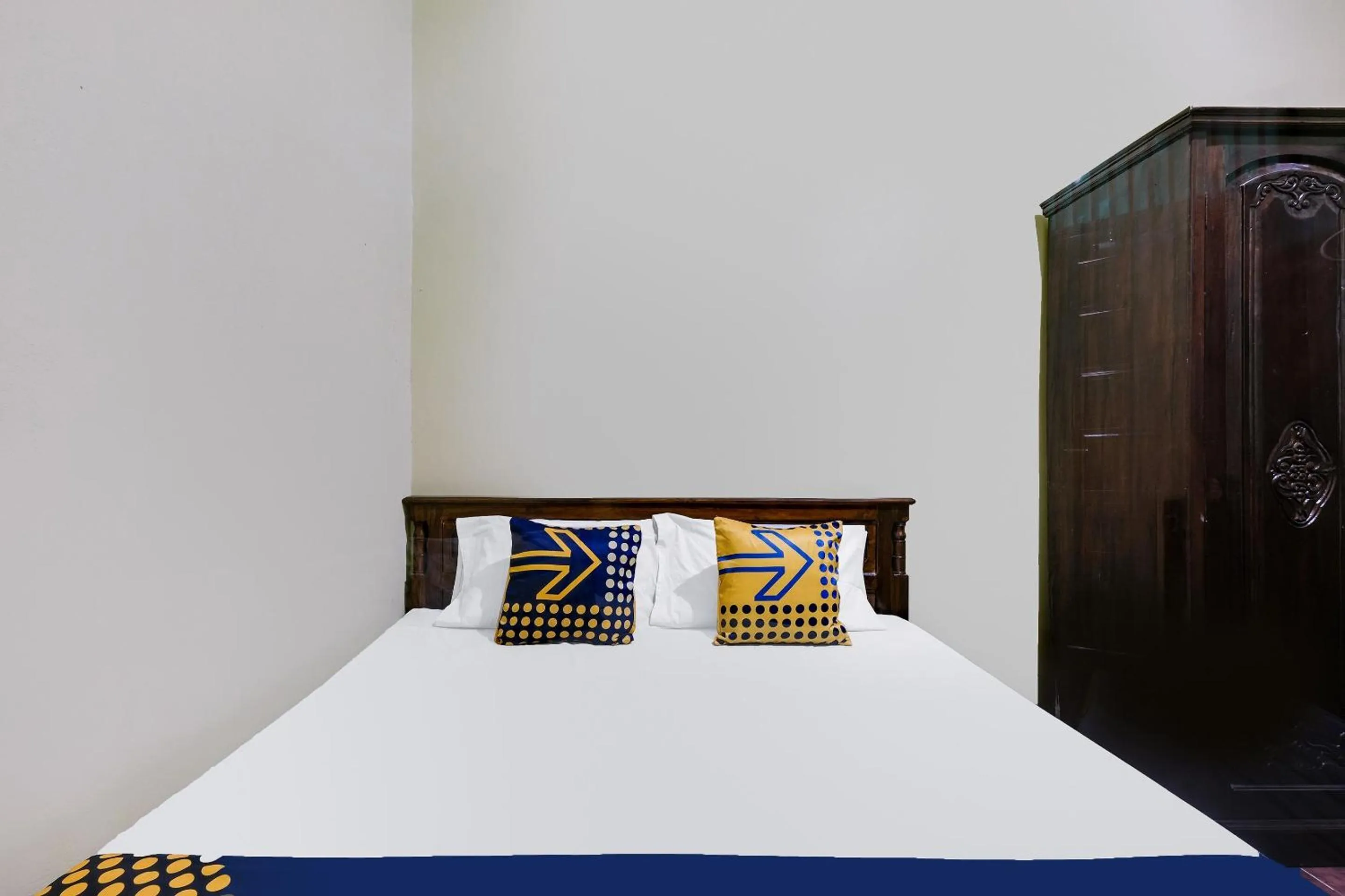 Bedroom in SPOT ON 92068 Pudja Kesuma Homestay Syariah Yogyakarta