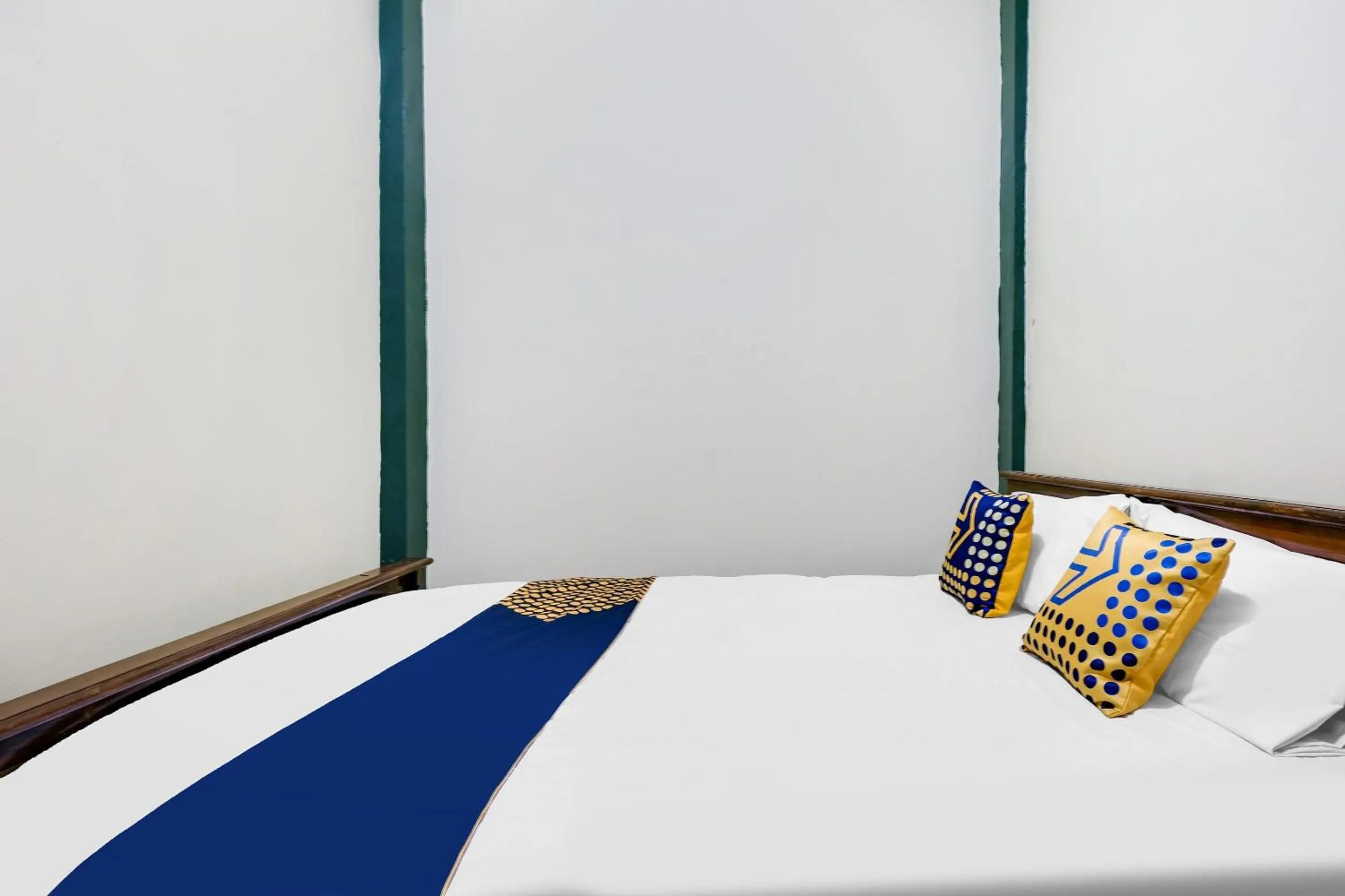 Bedroom in SPOT ON 92068 Pudja Kesuma Homestay Syariah Yogyakarta