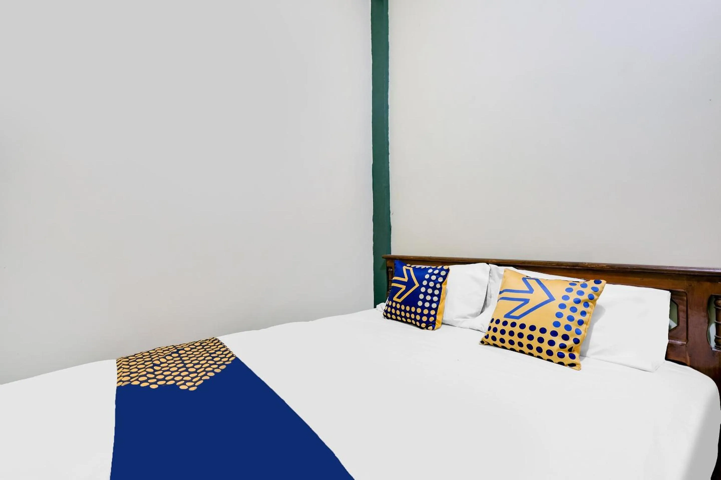 Bedroom in SPOT ON 92068 Pudja Kesuma Homestay Syariah Yogyakarta