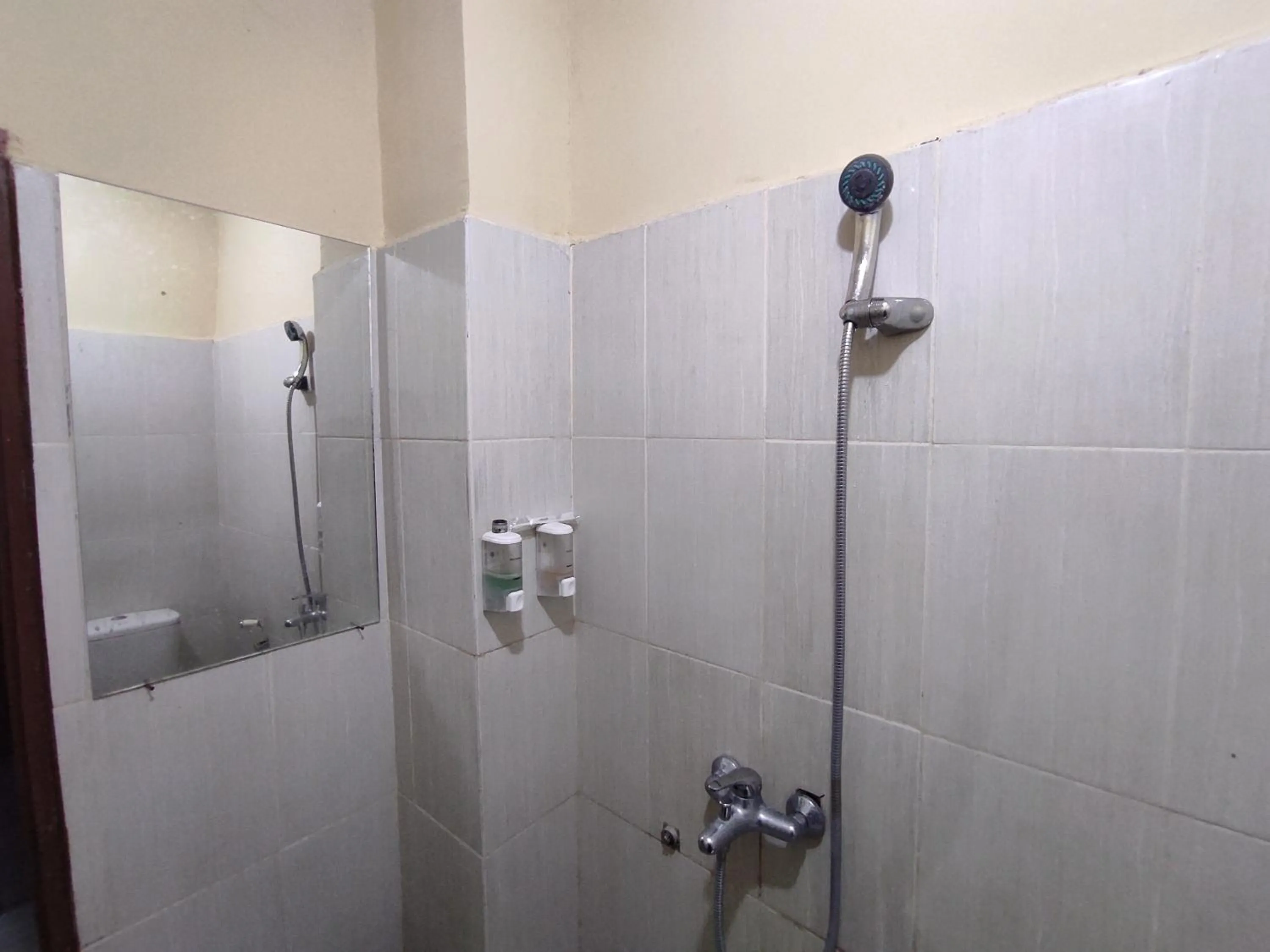 Bathroom in Hotel O Subur