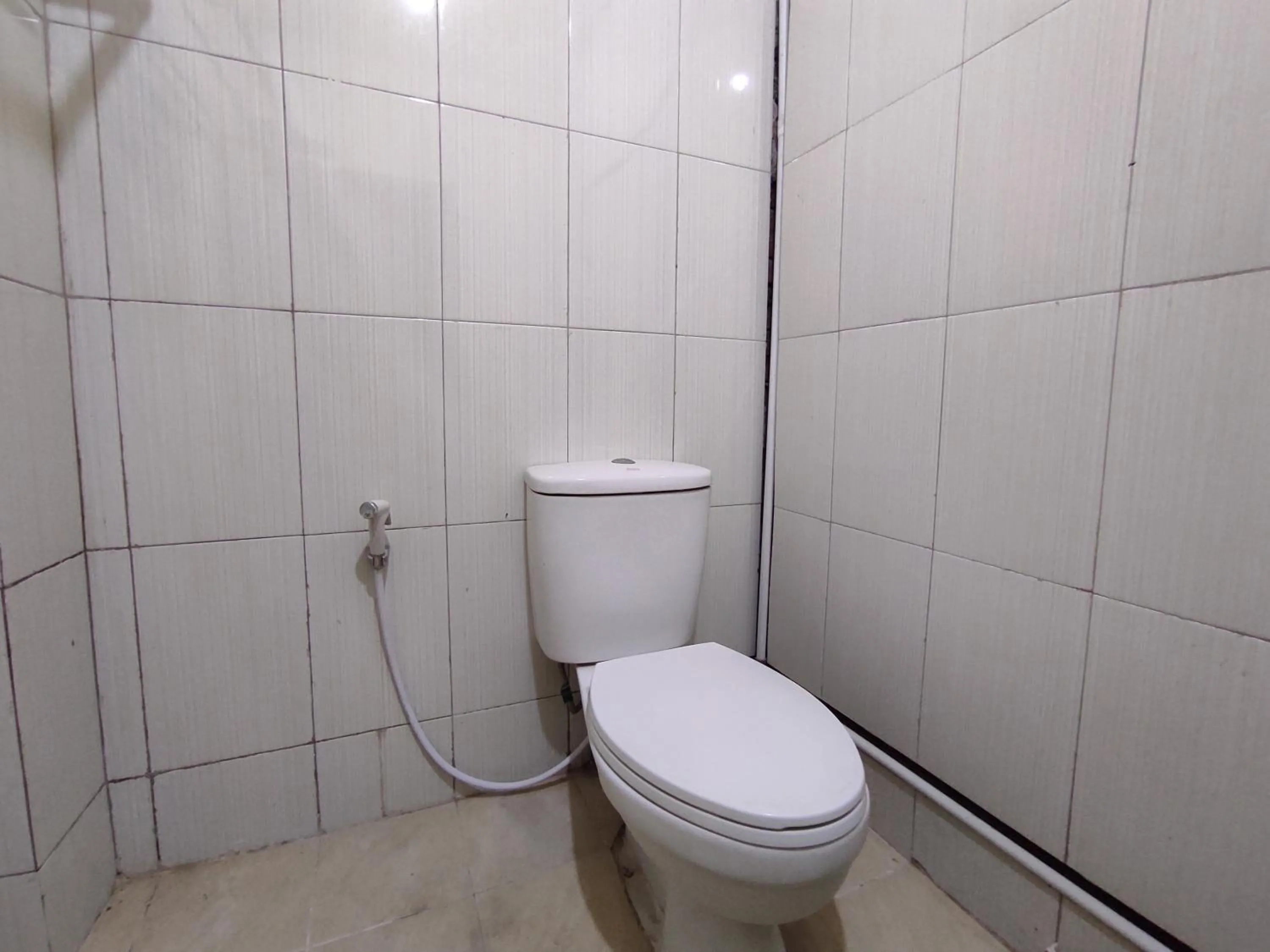 Bathroom in Hotel O Subur