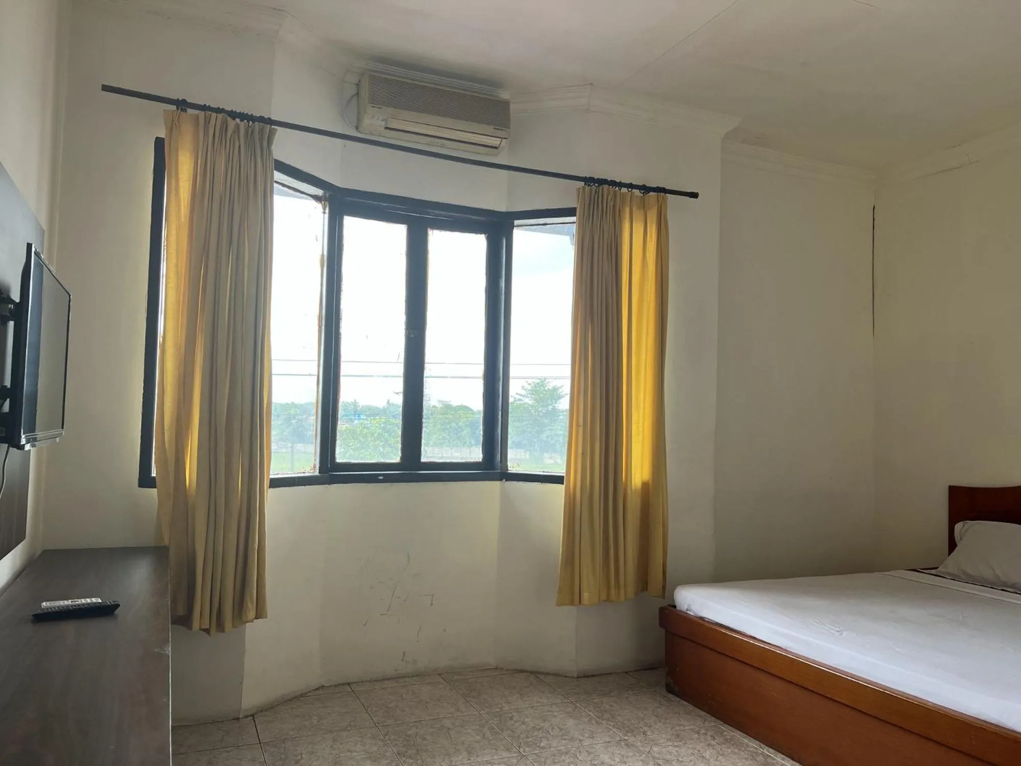 Bedroom, Bed in Hotel O Kost Orange Syariah