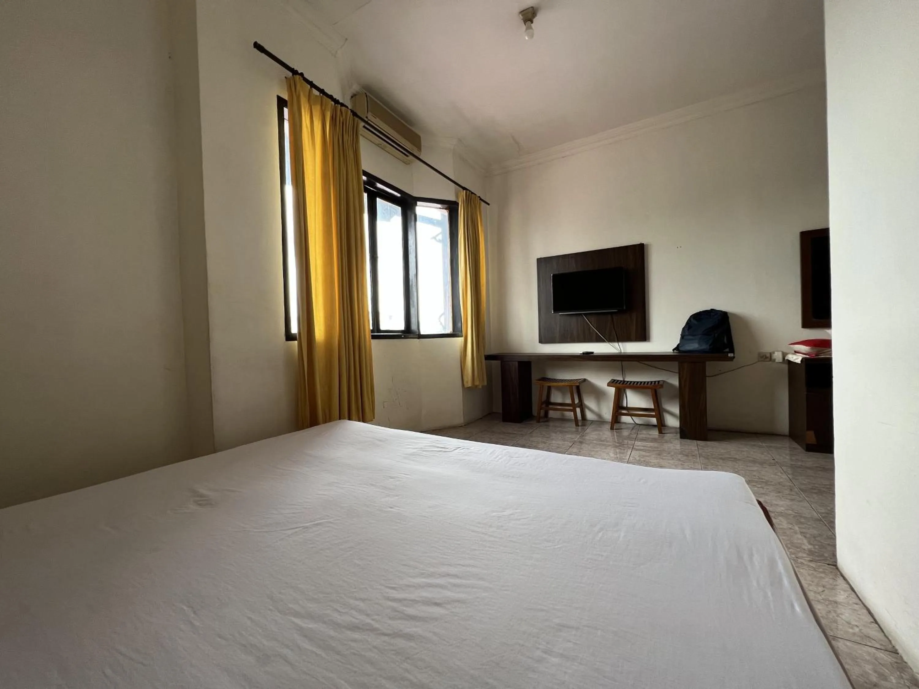 Bedroom, Bed in Hotel O Kost Orange Syariah