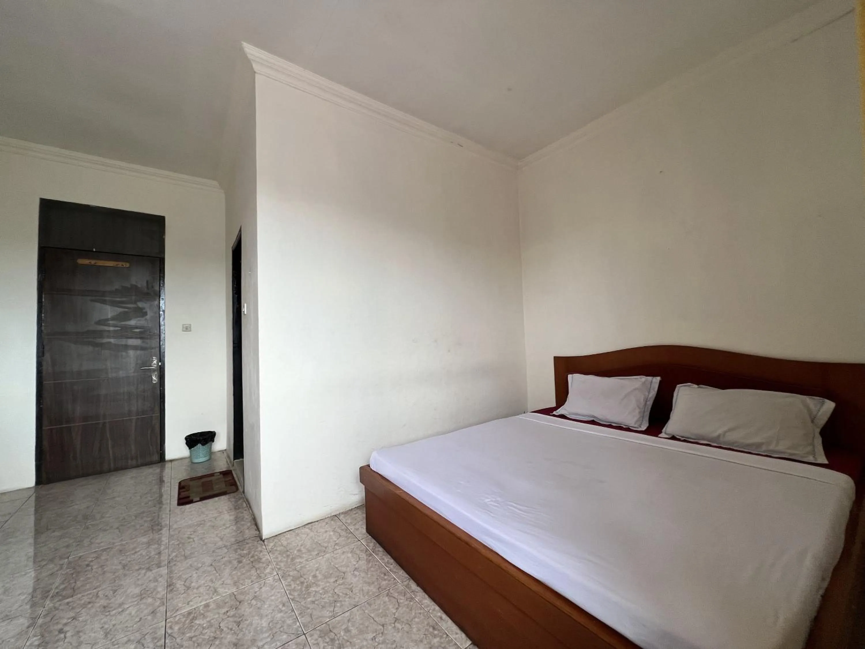 Bedroom, Bed in Hotel O Kost Orange Syariah