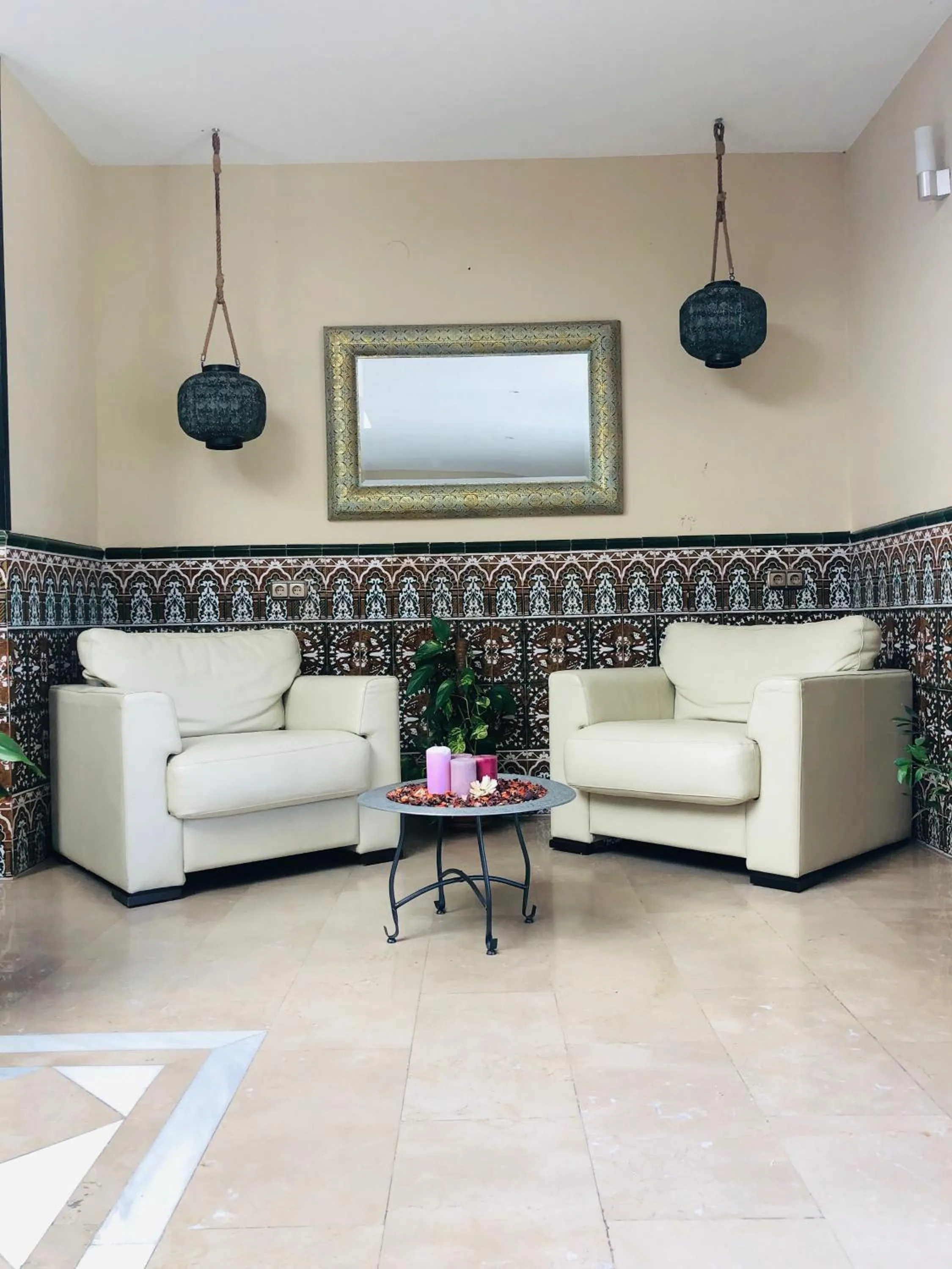 Lobby or reception in Hotel Puerta Nazarí