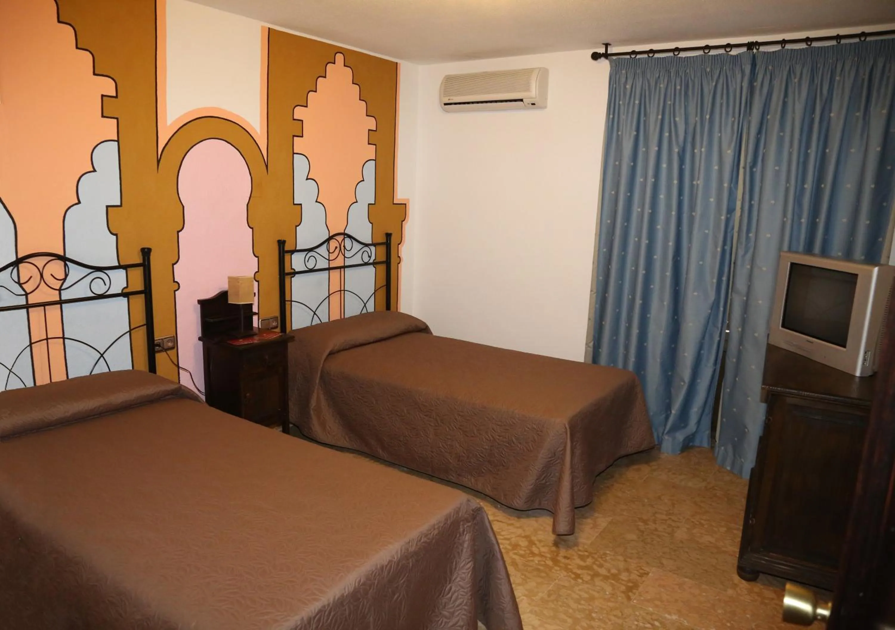 Bedroom, Bed in Hotel Puerta Nazarí