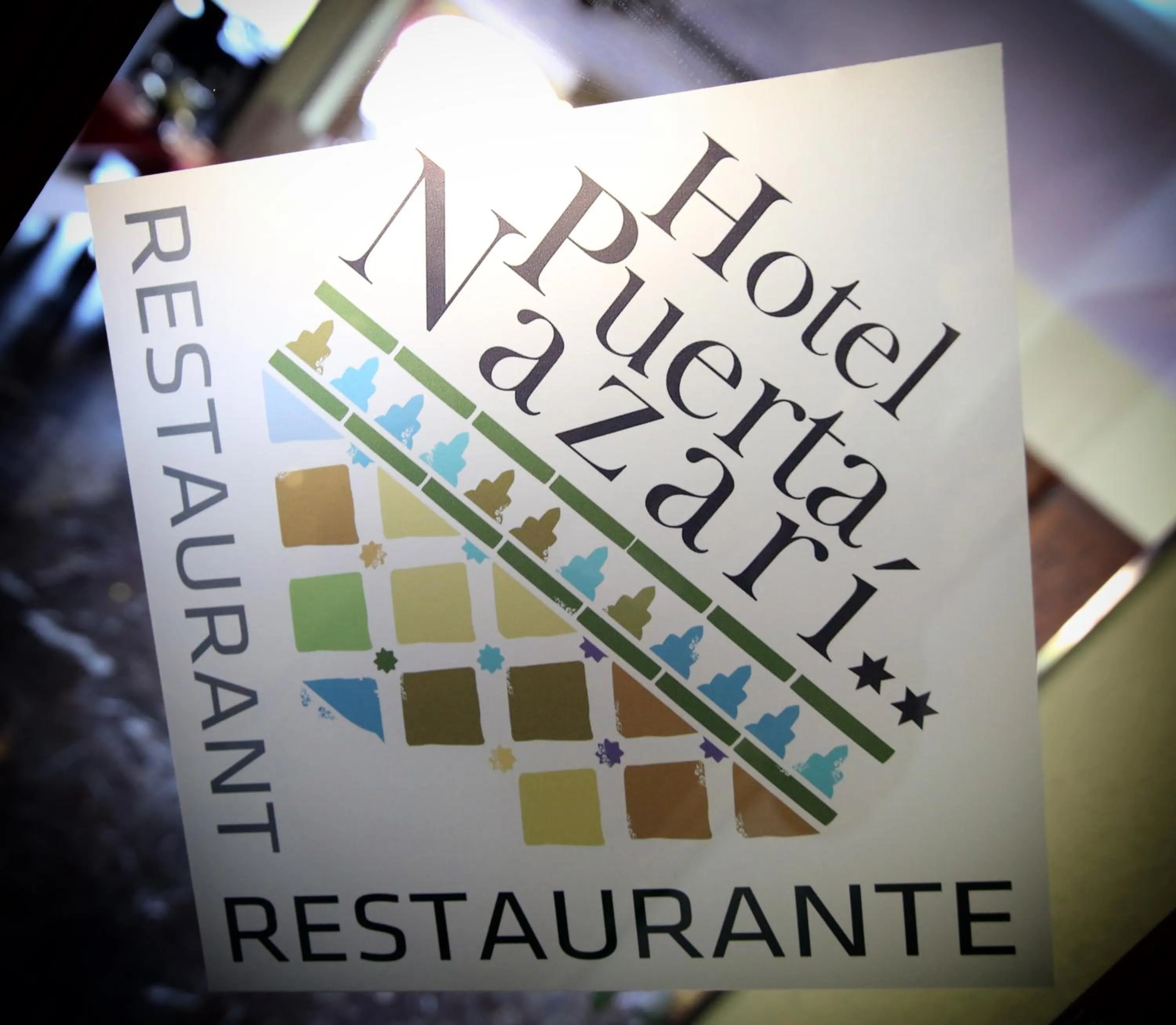 Property logo or sign in Hotel Puerta Nazarí