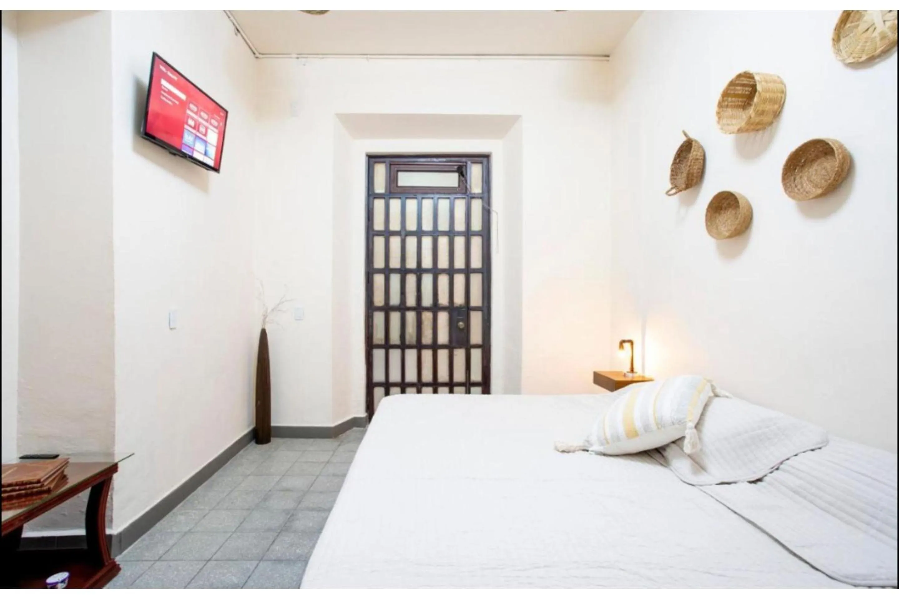 Bedroom in Capital O Mansión Del Tequila