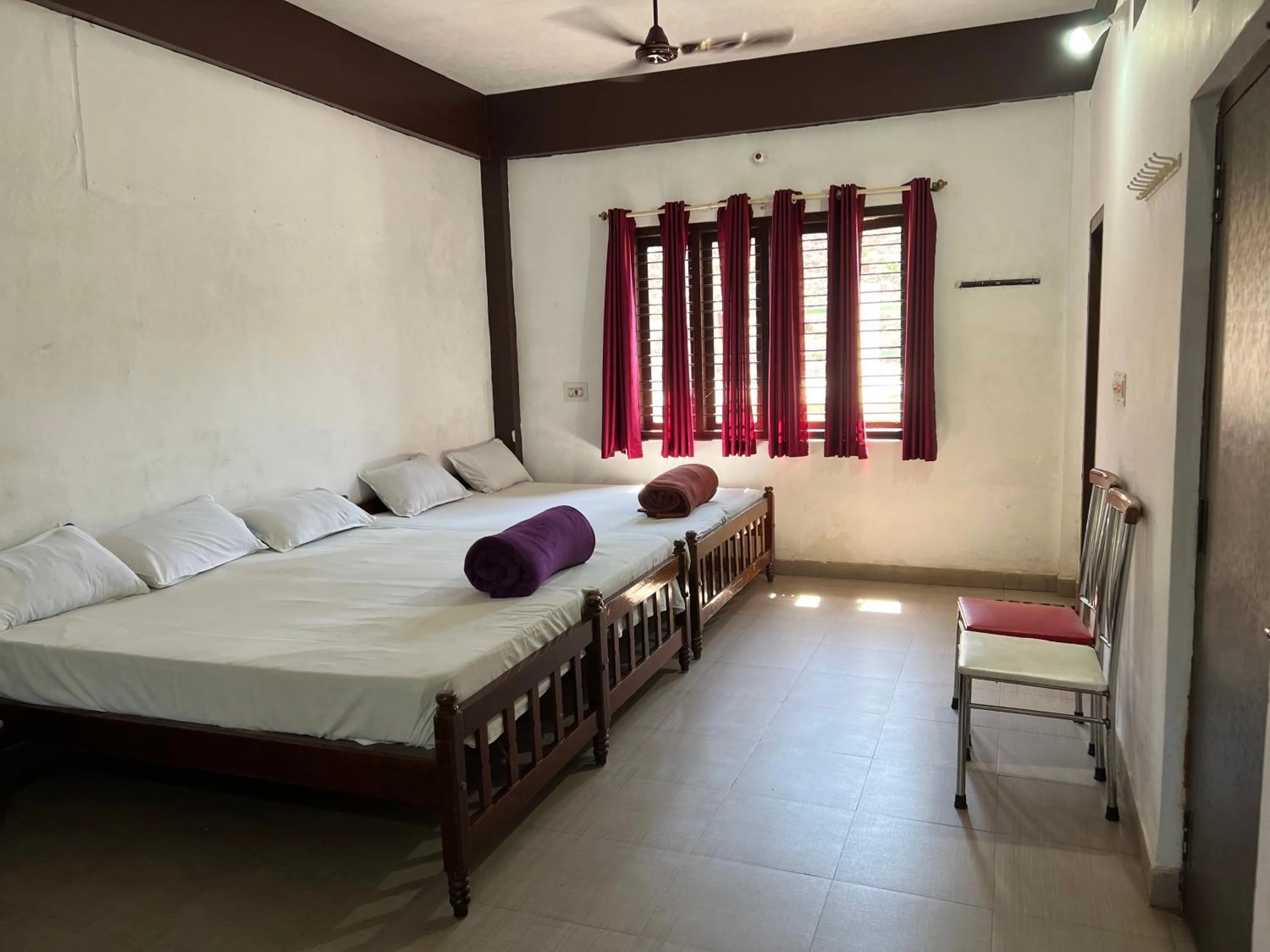 Bed in Hotel Caveri Inn