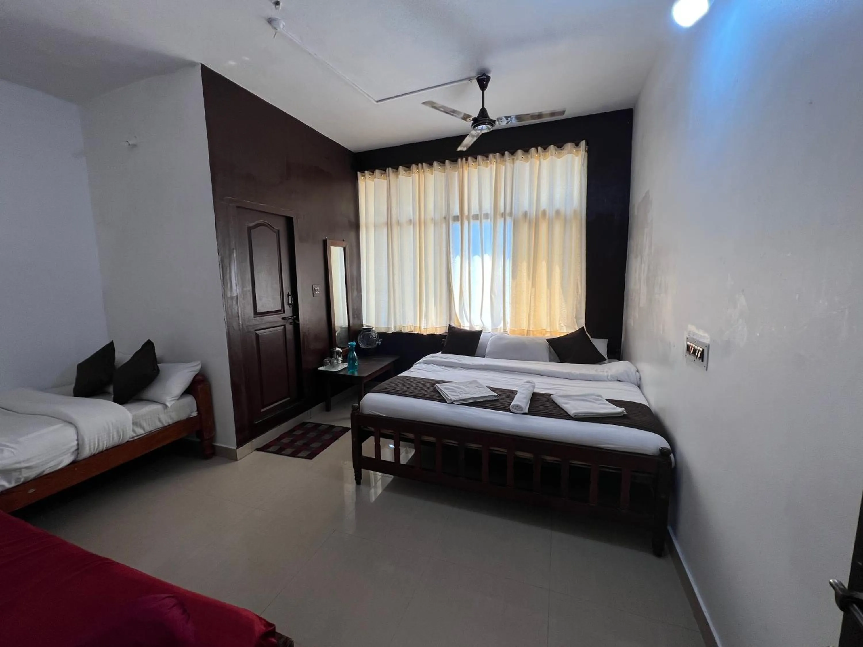Bed in Hotel Caveri Inn