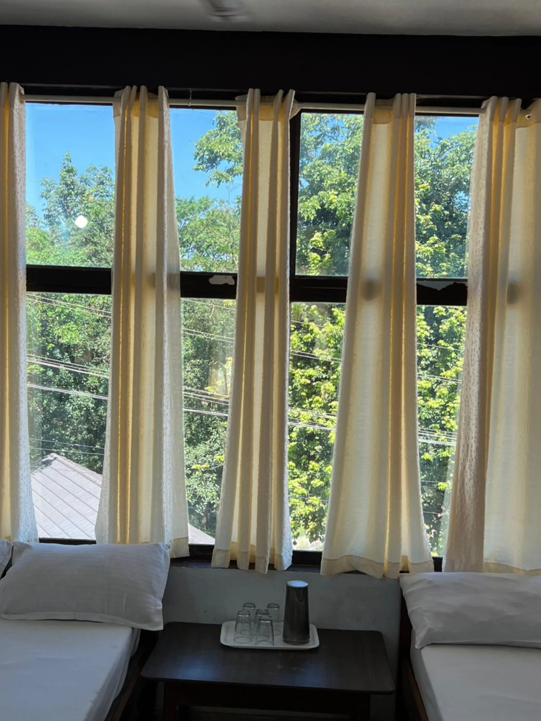 Bed in Hotel Caveri Inn