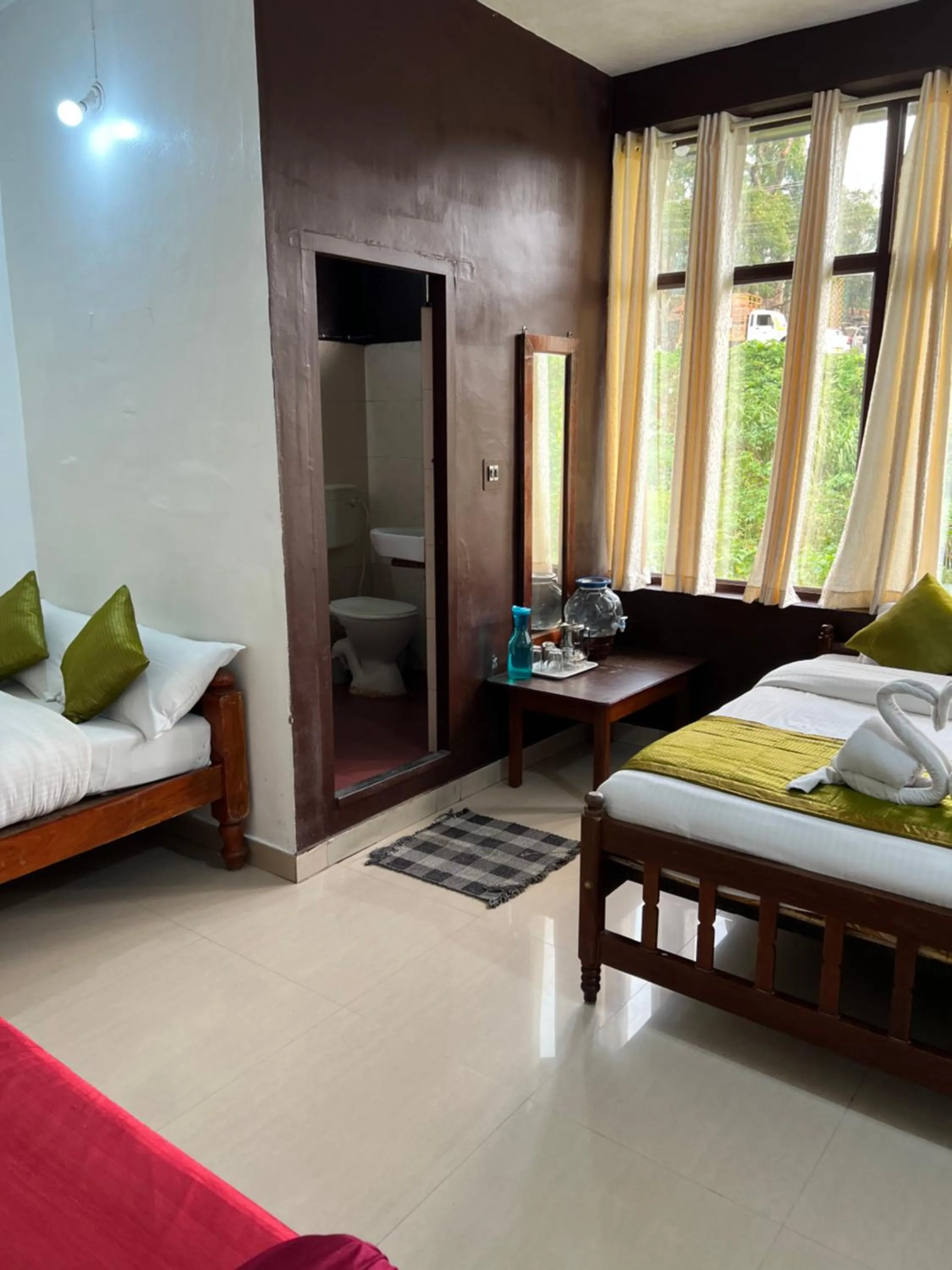 Bed in Hotel Caveri Inn