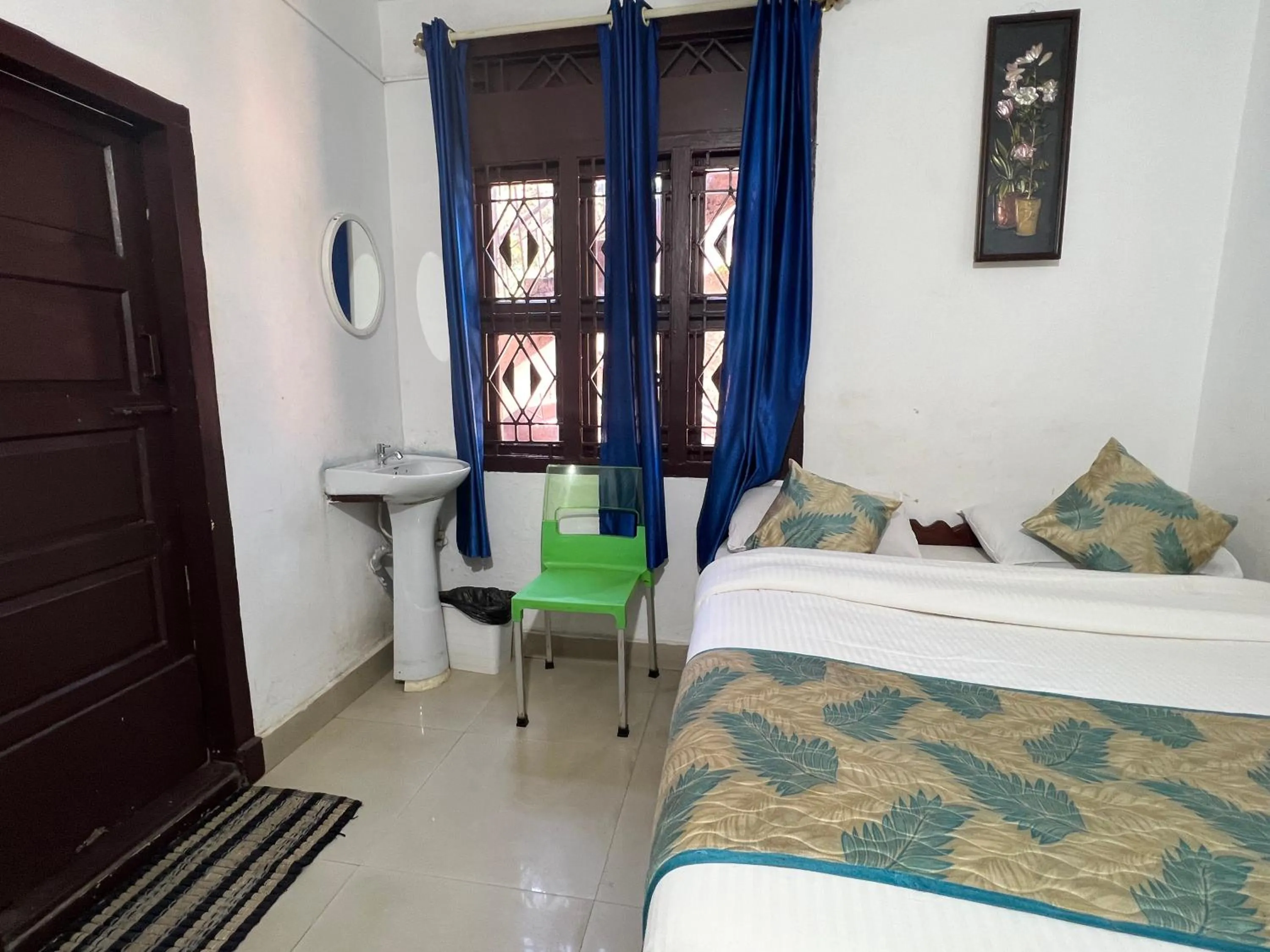 Bed in Hotel Caveri Inn