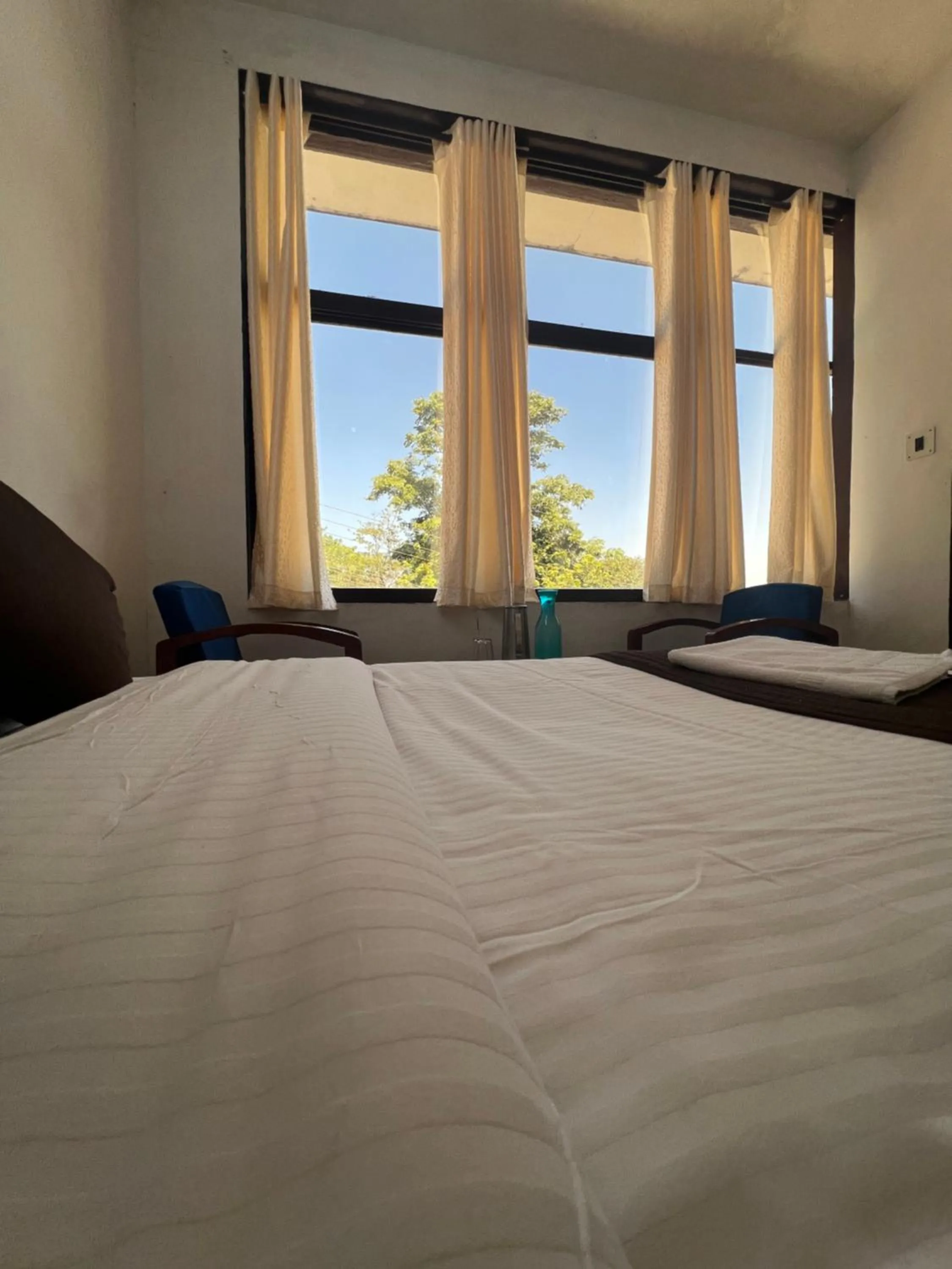 Bed in Hotel Caveri Inn
