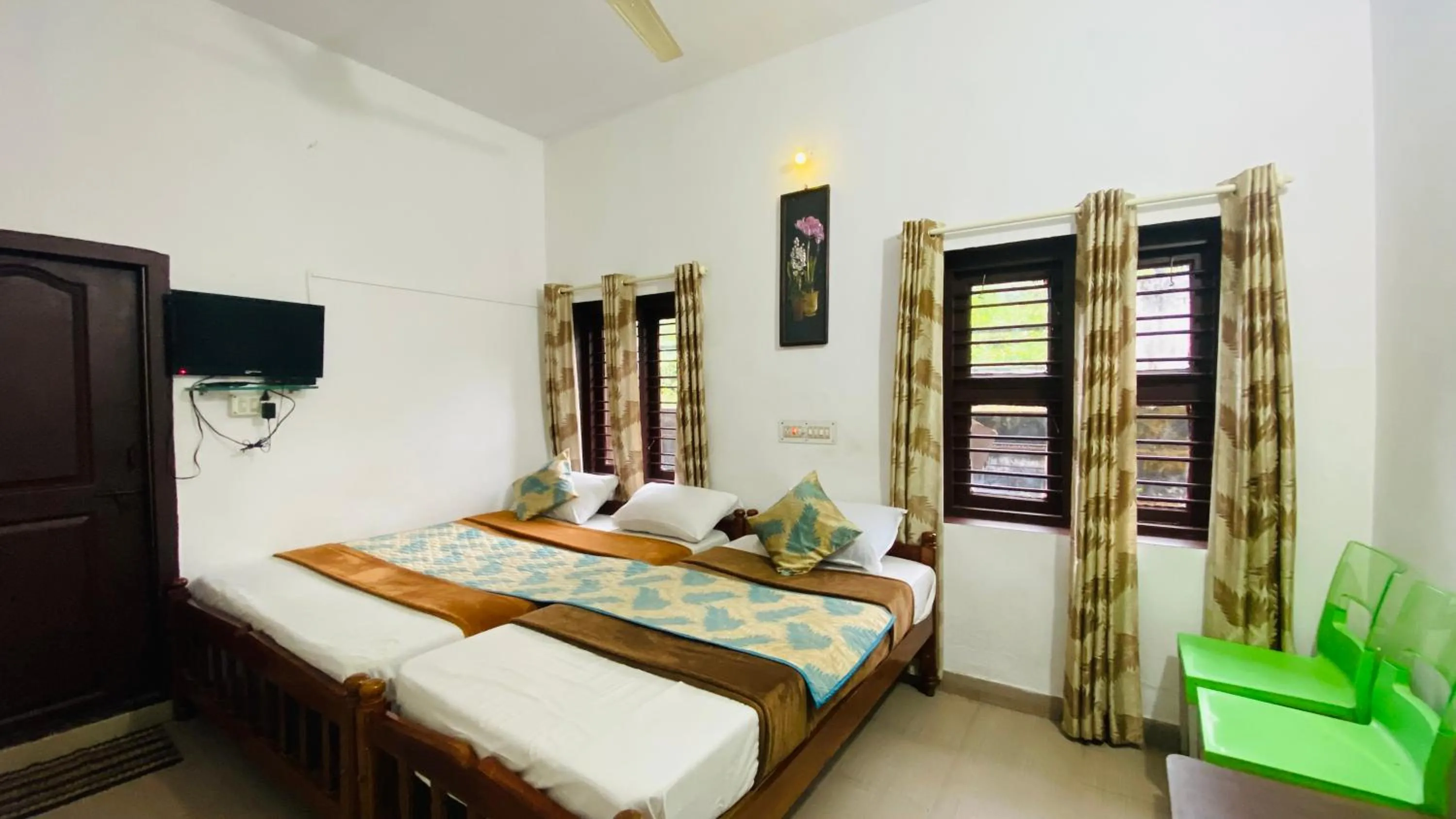 Bed in Hotel Caveri Inn