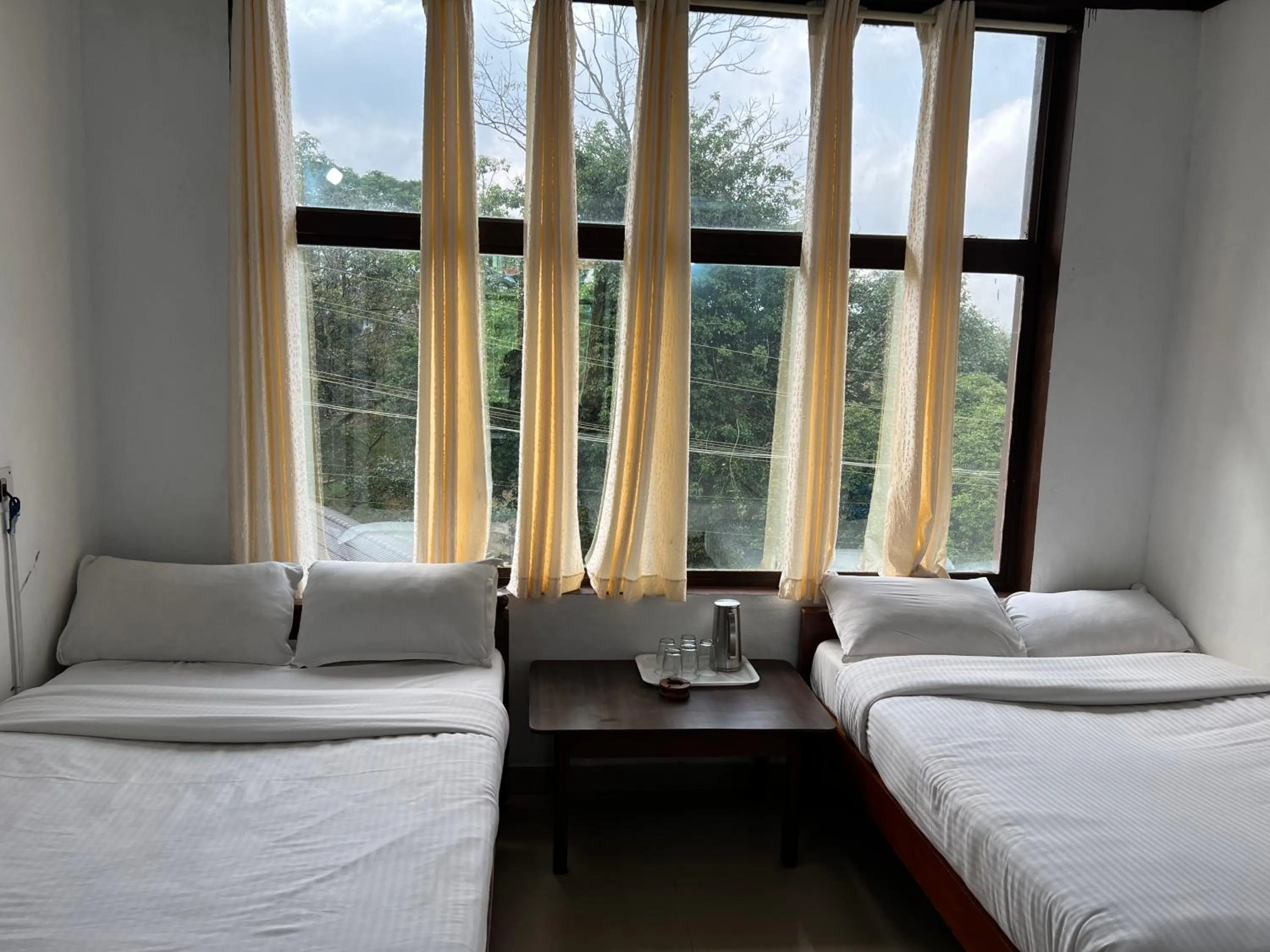 Bed in Hotel Caveri Inn