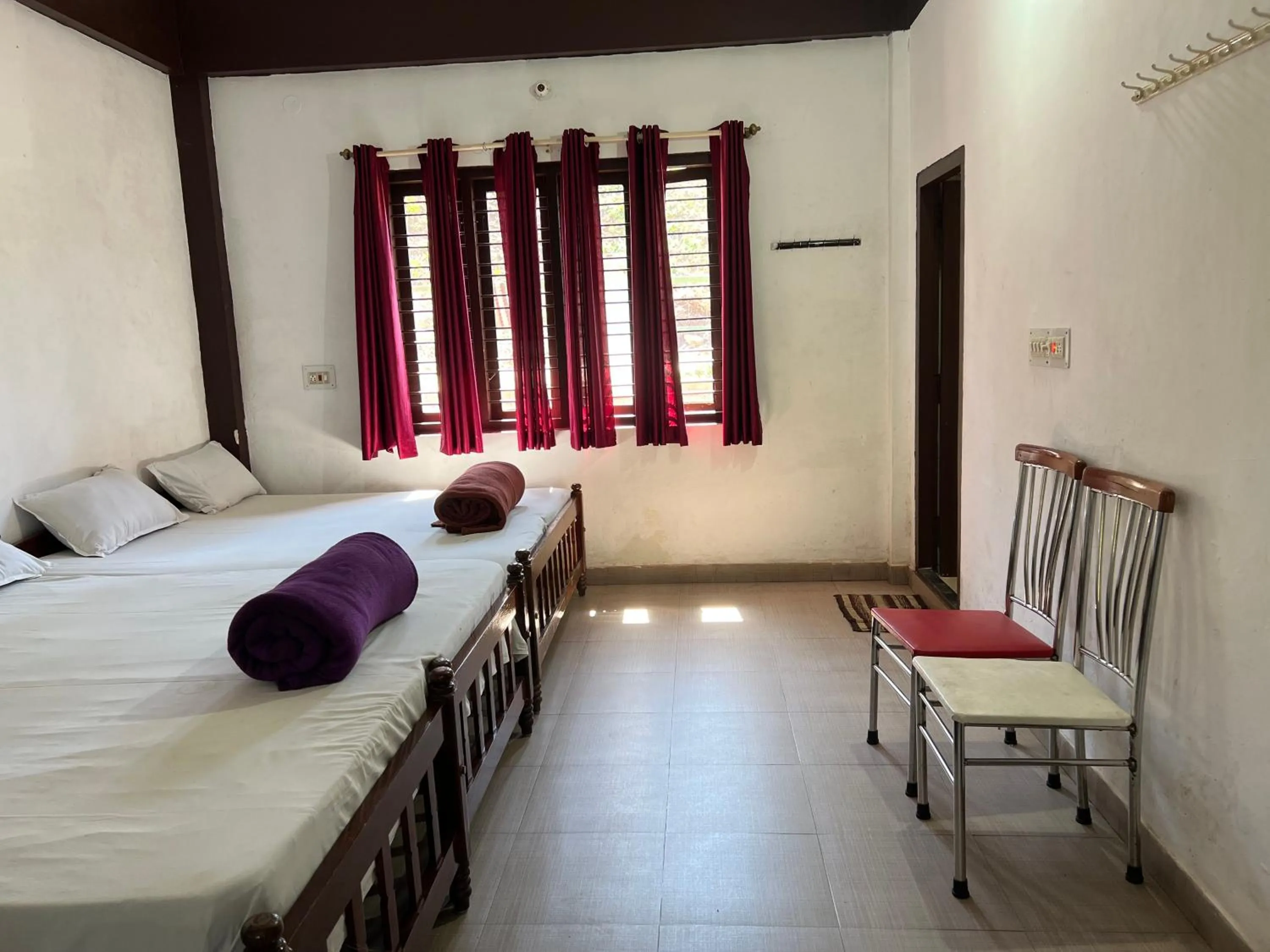 Bed in Hotel Caveri Inn
