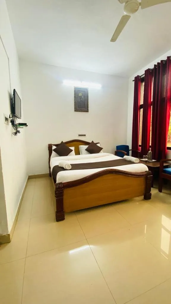 Bed in Hotel Caveri Inn