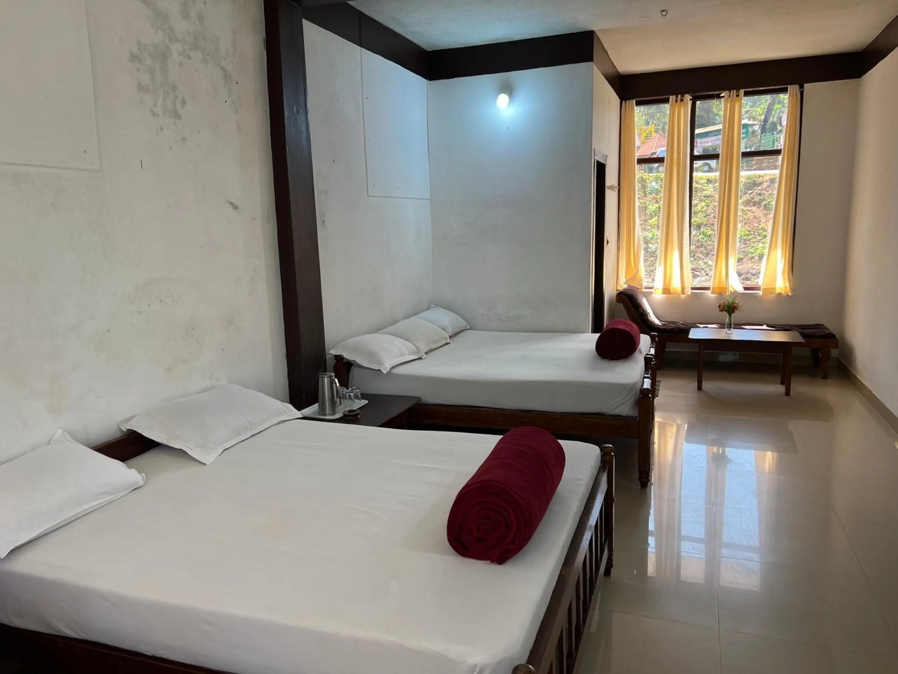 Bed in Hotel Caveri Inn