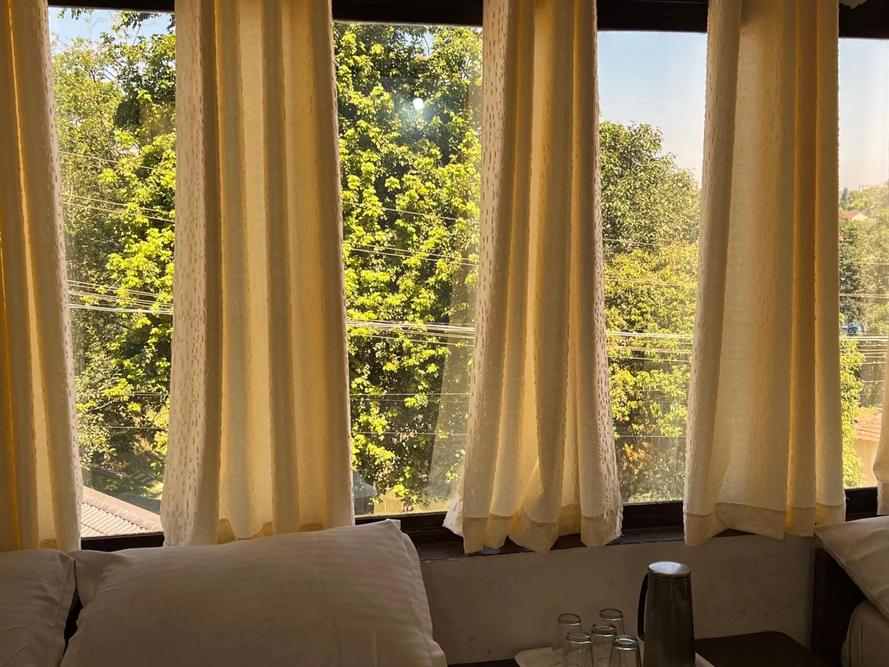 Bed in Hotel Caveri Inn
