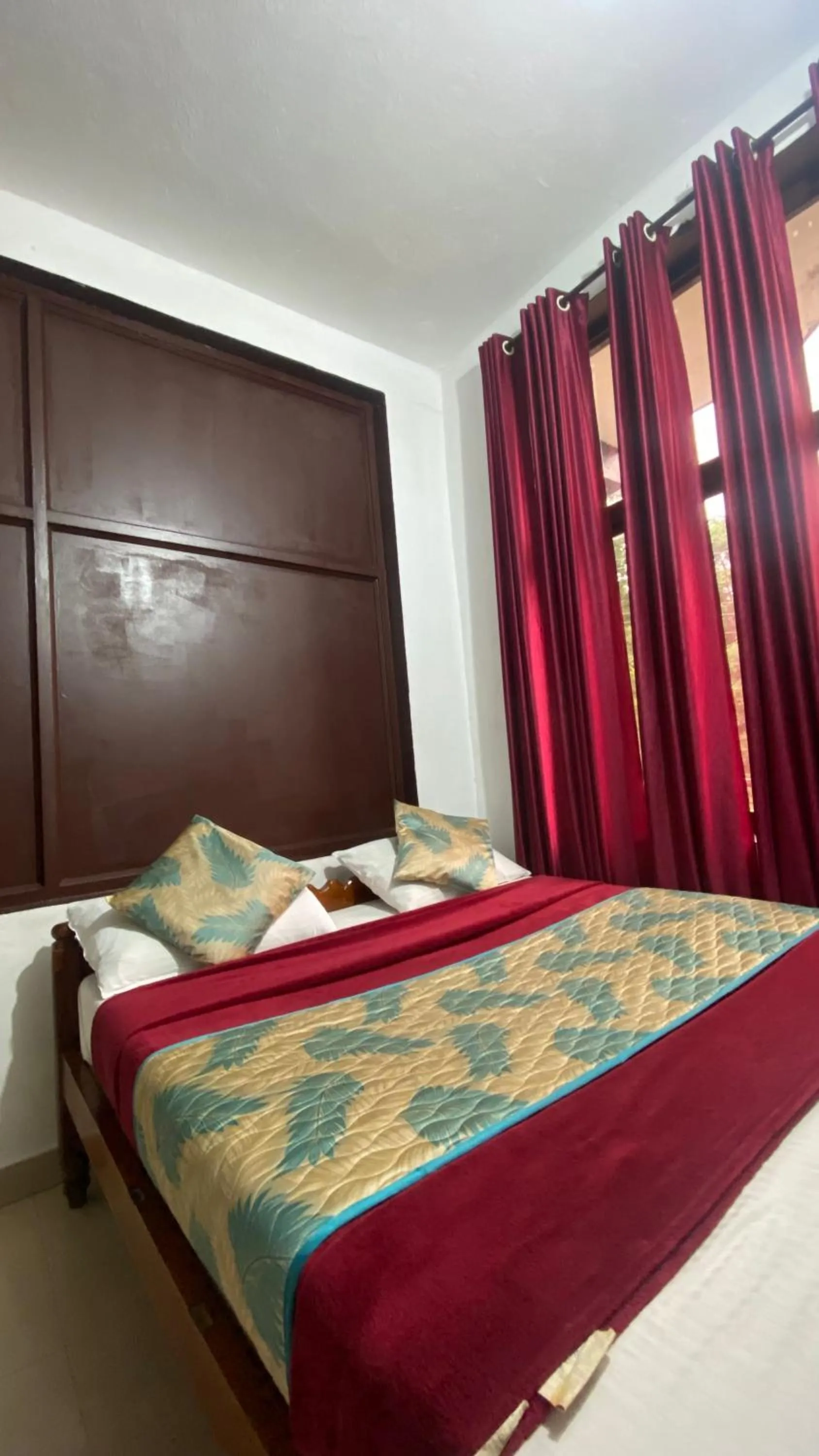 Bed in Hotel Caveri Inn