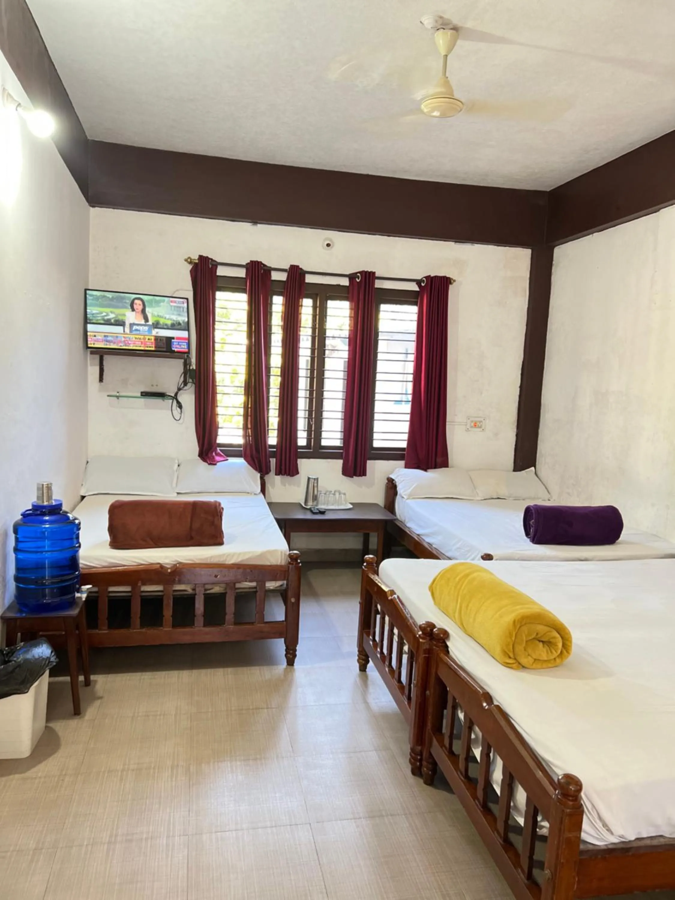 Bed in Hotel Caveri Inn