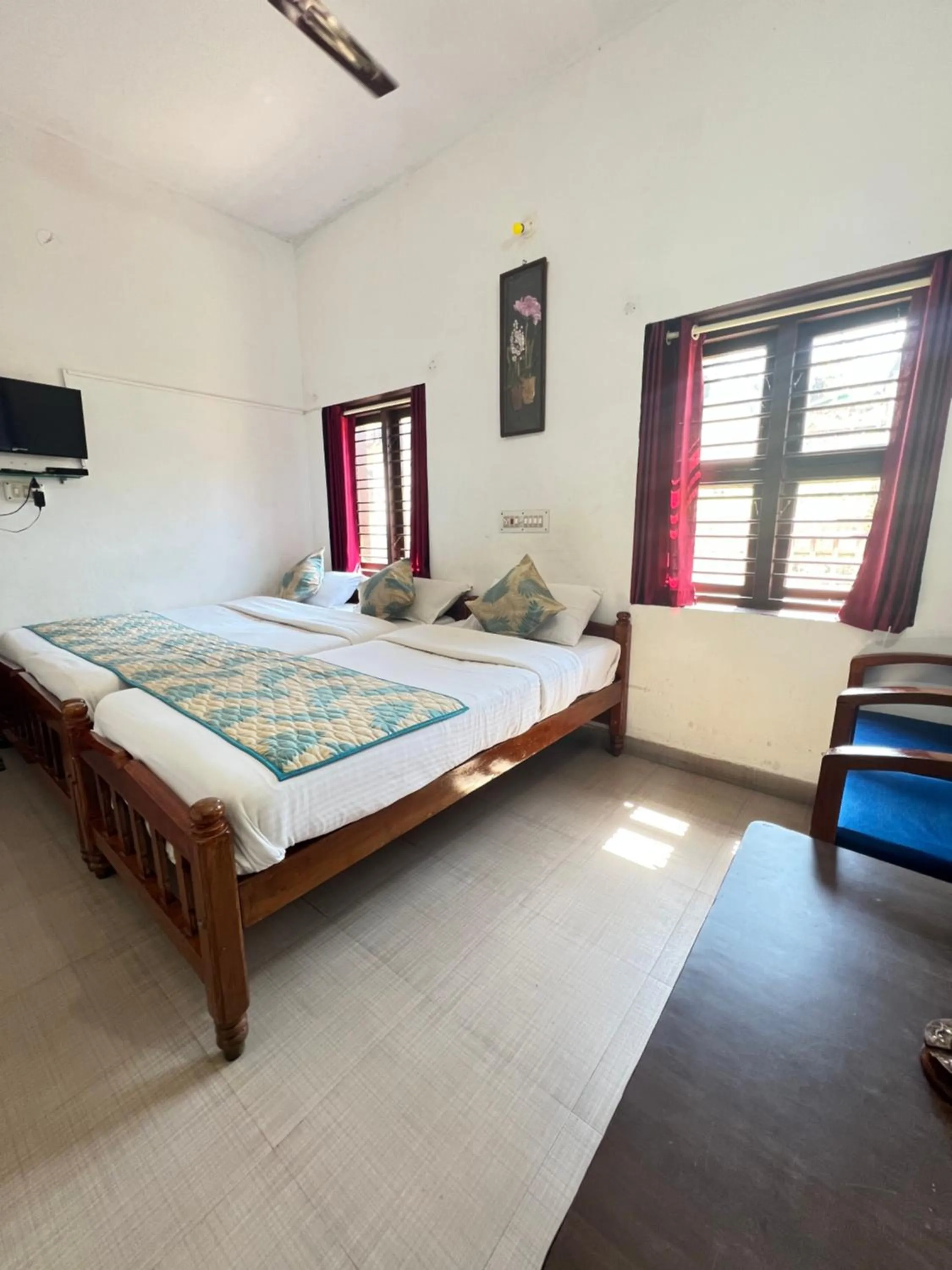 Bed in Hotel Caveri Inn
