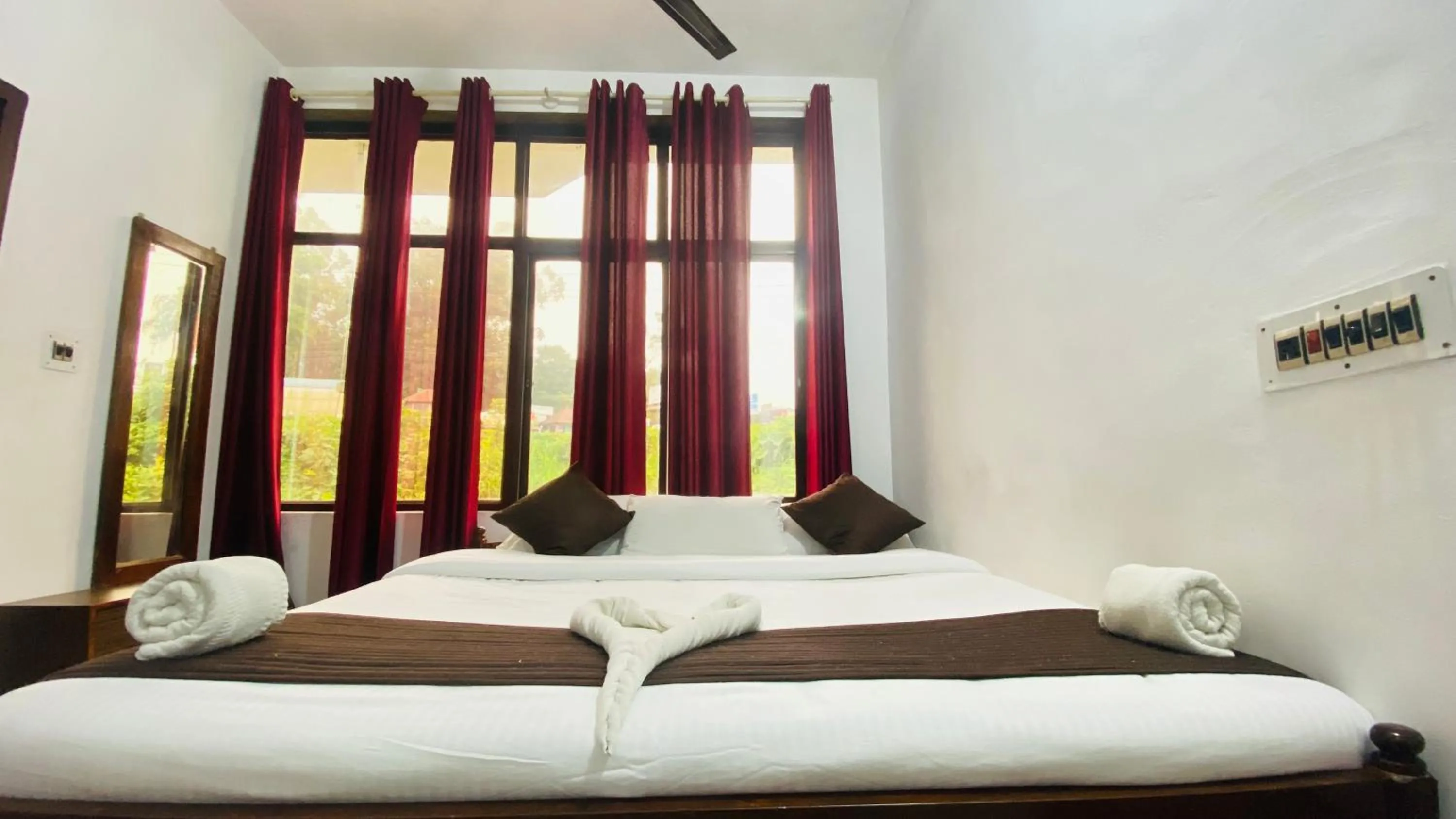 Bed in Hotel Caveri Inn