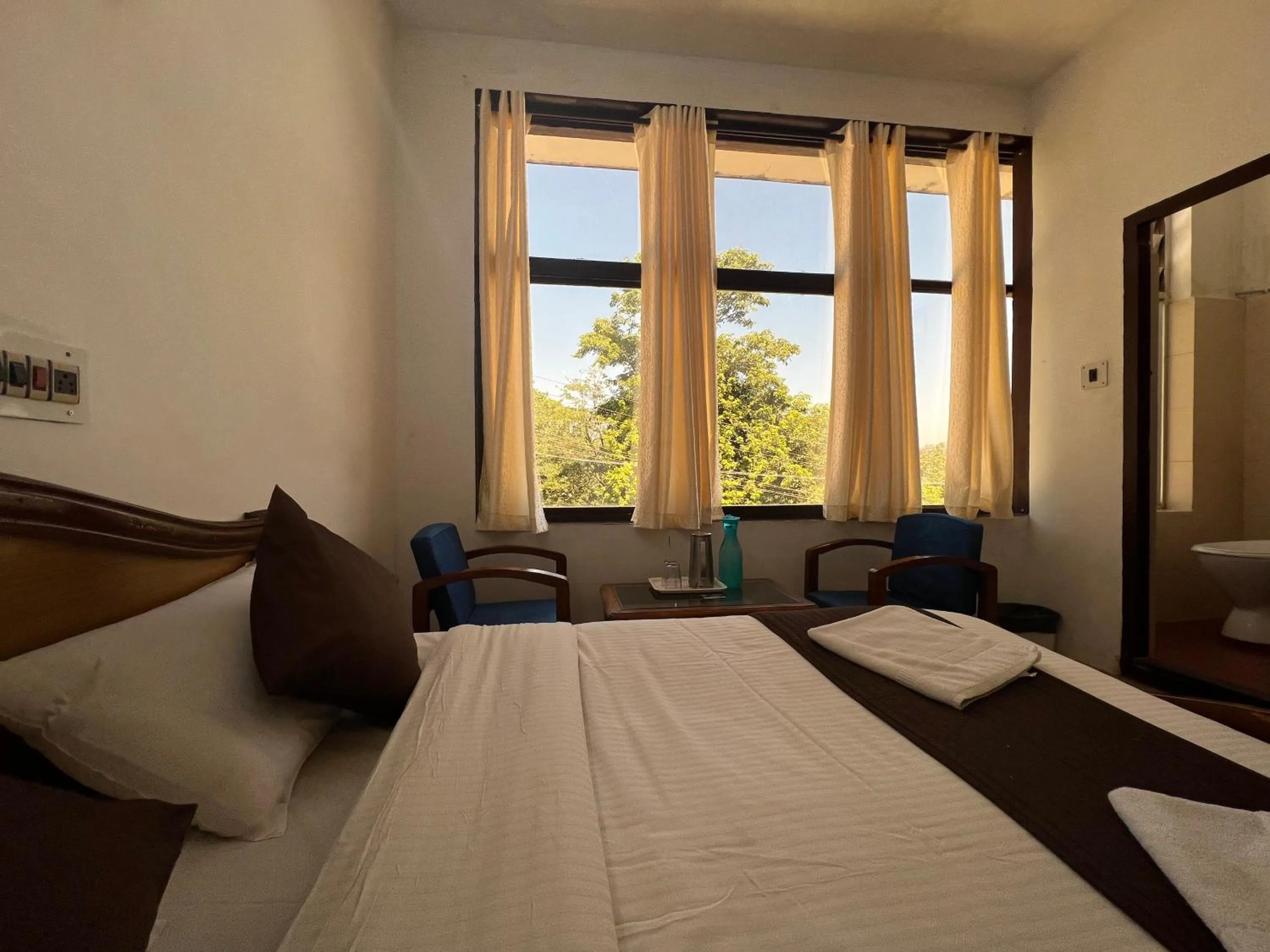 Bed in Hotel Caveri Inn