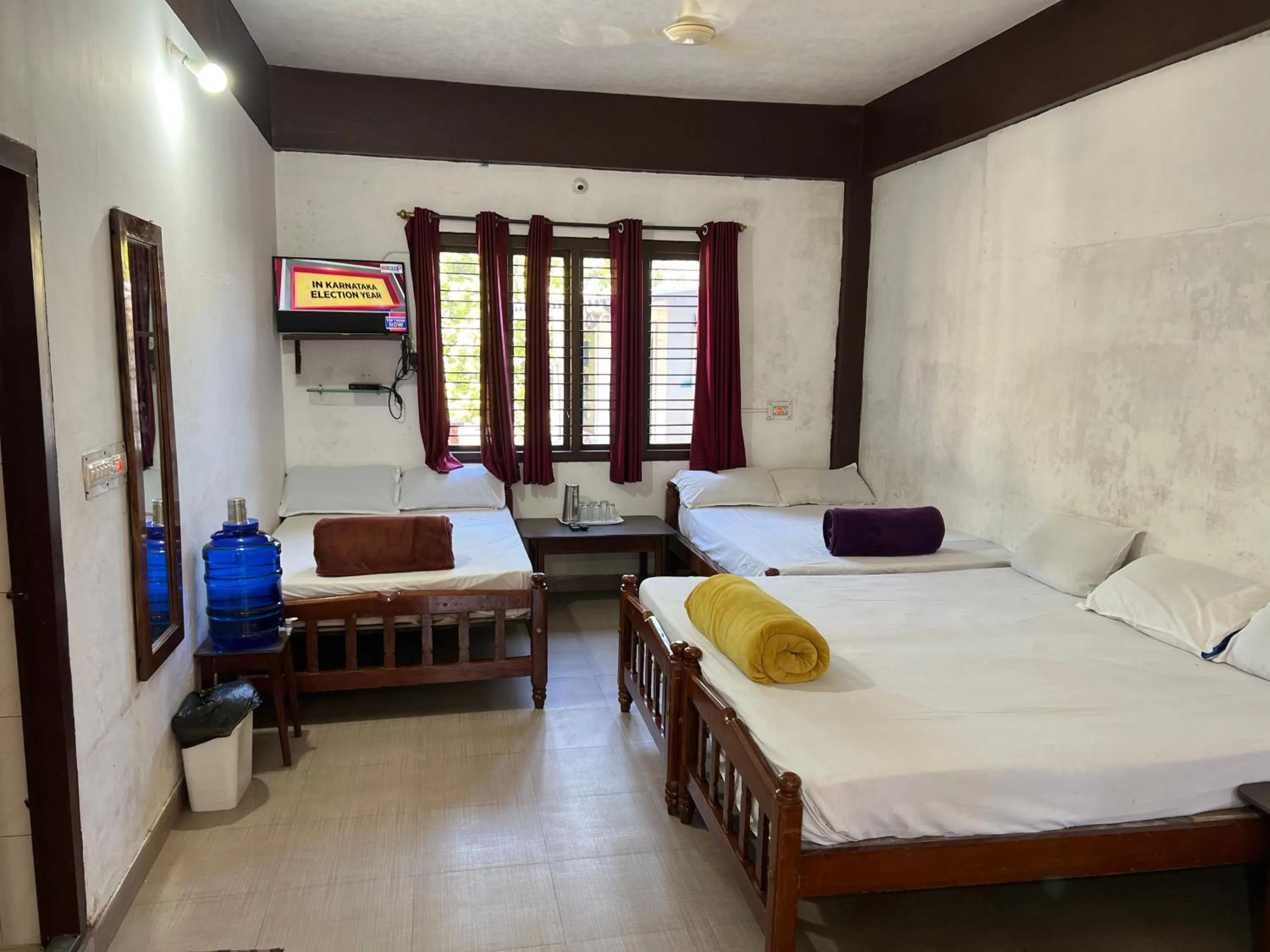 Bed in Hotel Caveri Inn