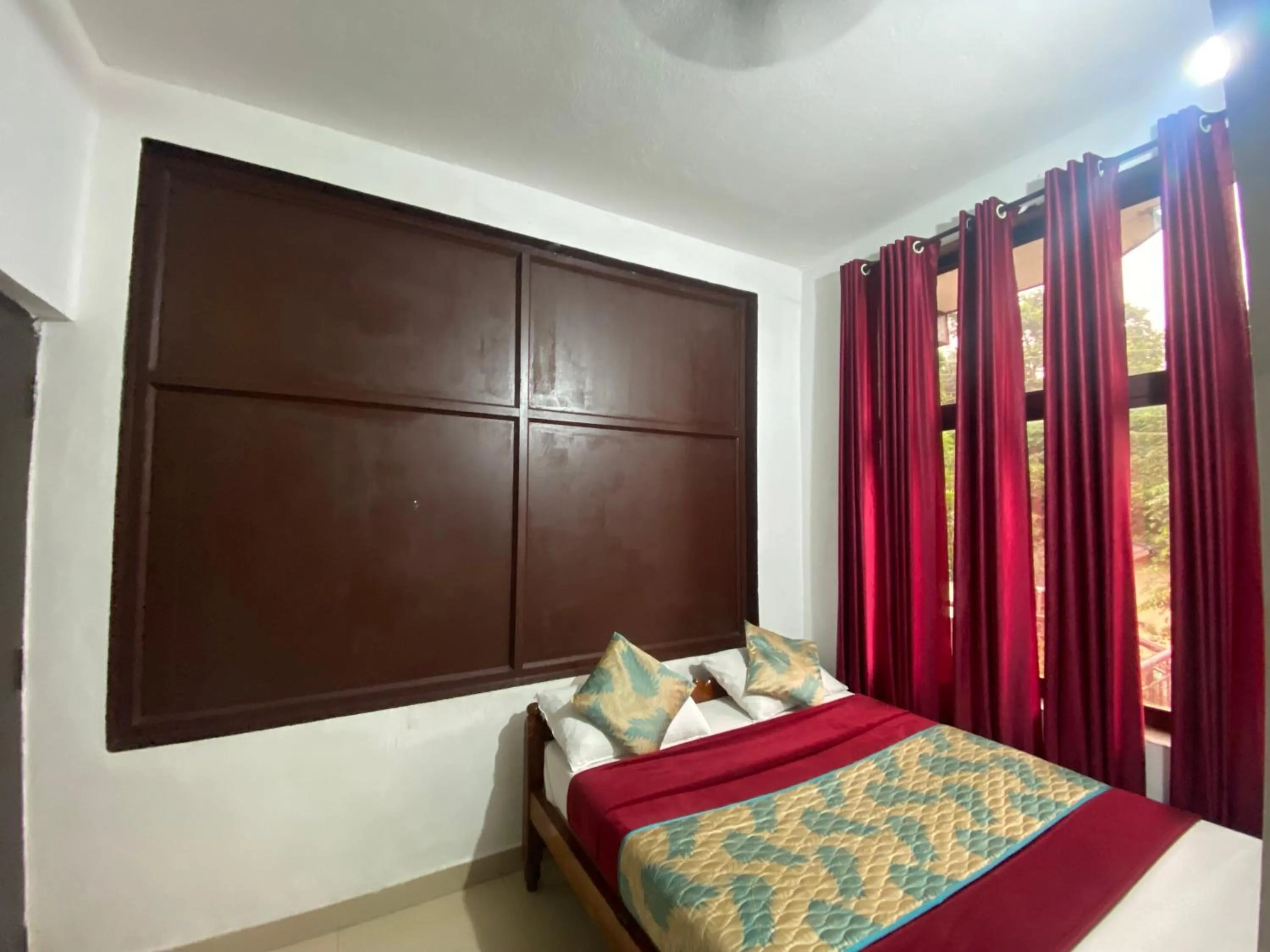 Bed in Hotel Caveri Inn