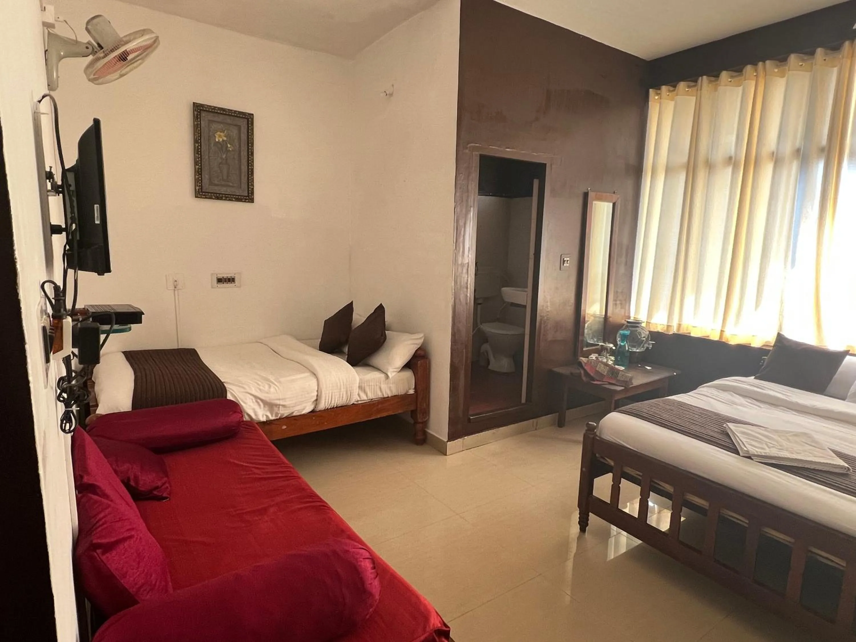Bed in Hotel Caveri Inn