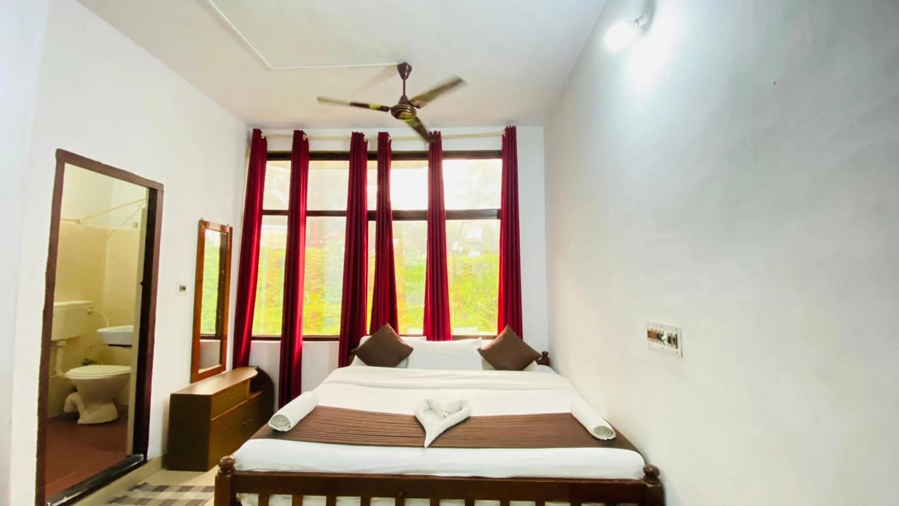 Bed in Hotel Caveri Inn