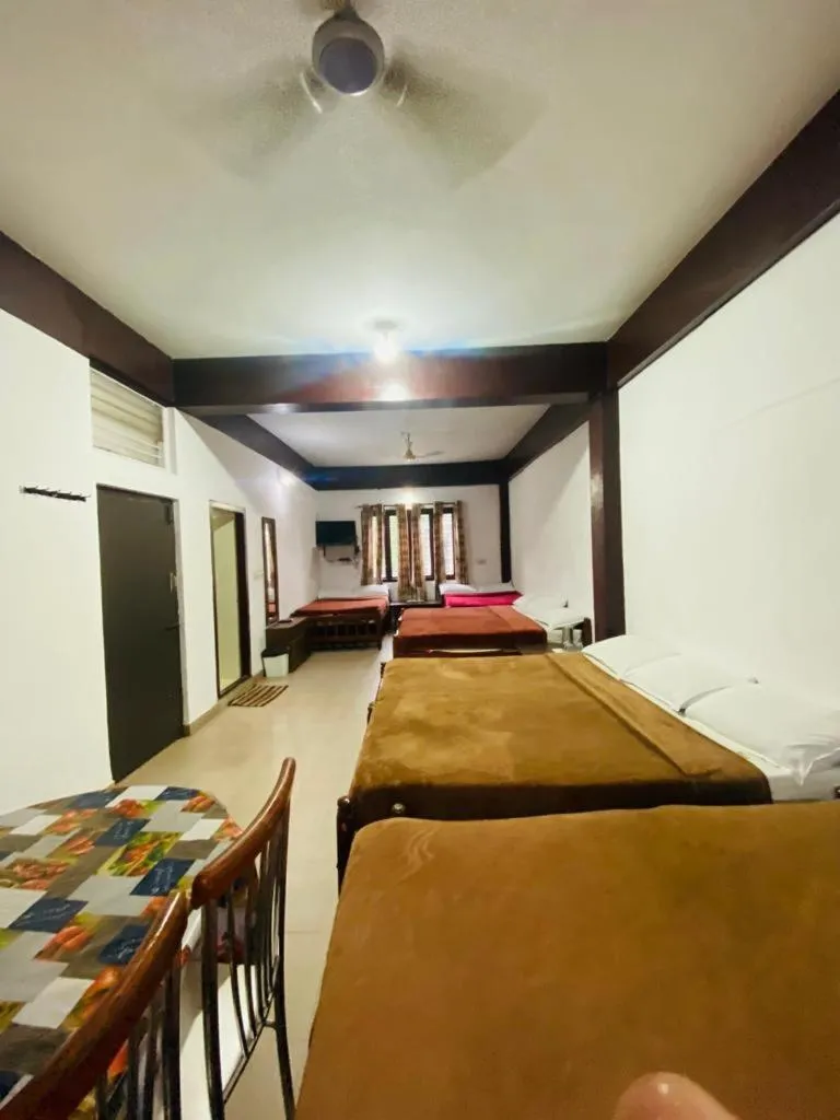 Bed in Hotel Caveri Inn