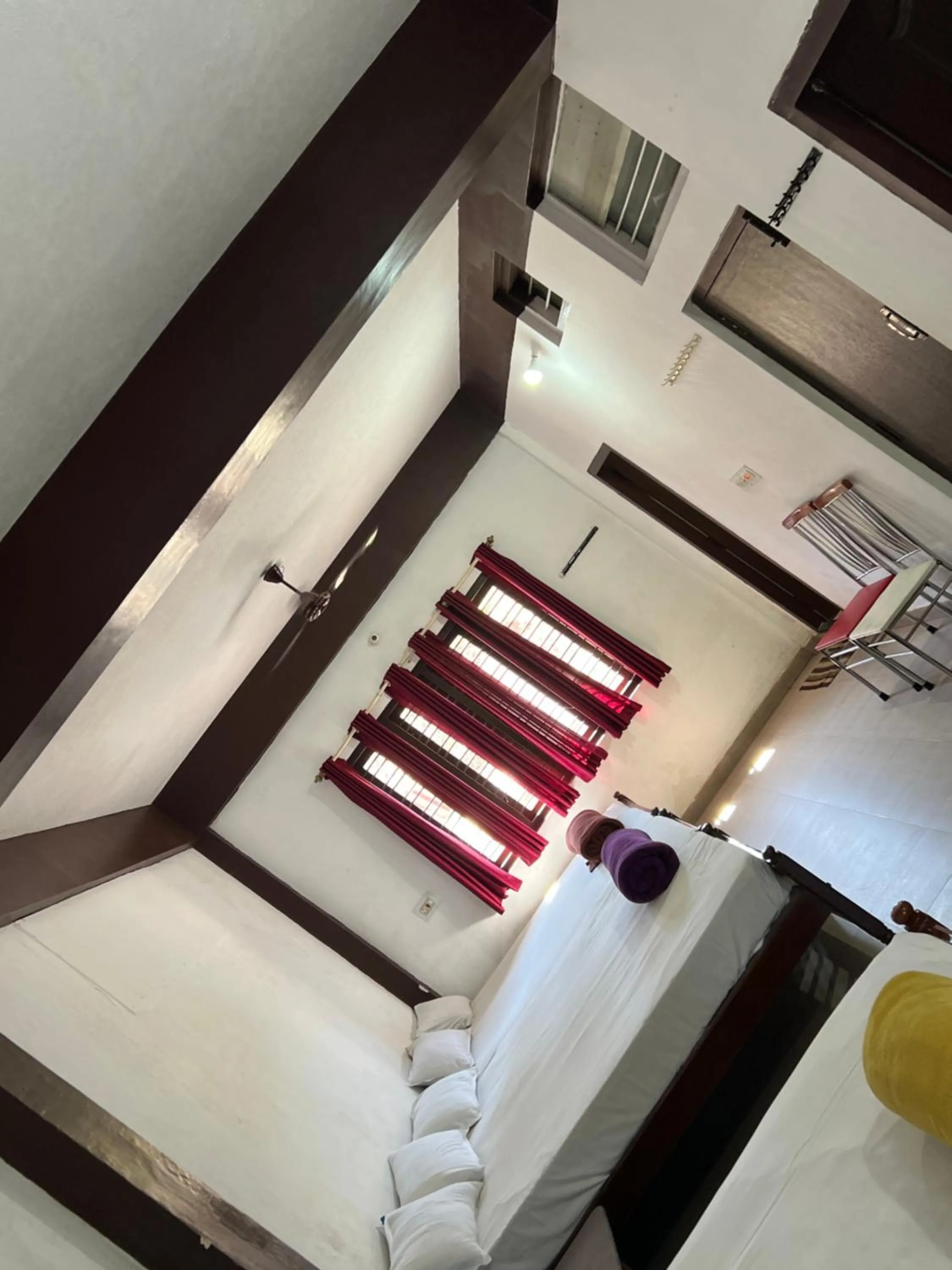 Bed in Hotel Caveri Inn