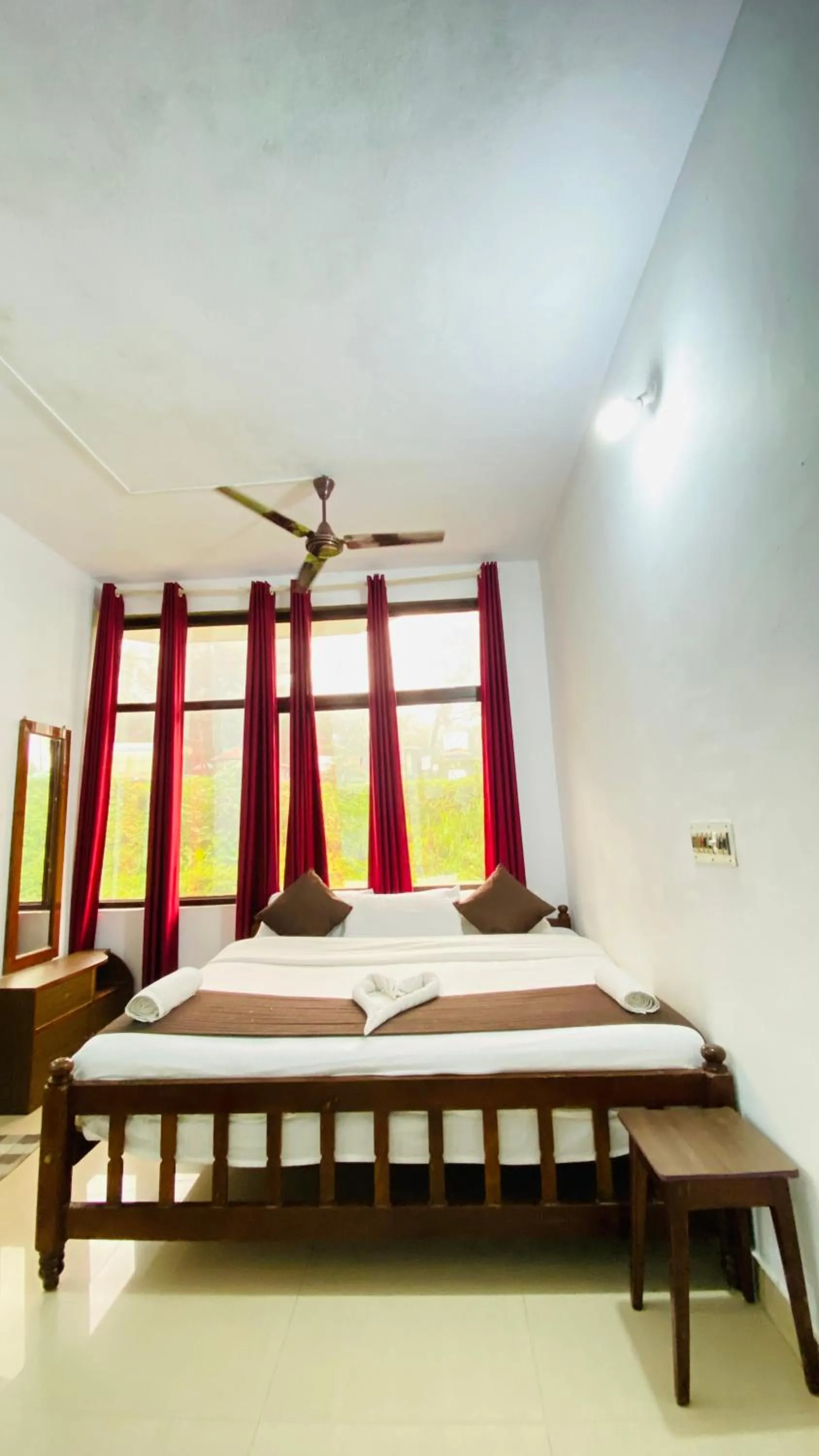 Bed in Hotel Caveri Inn