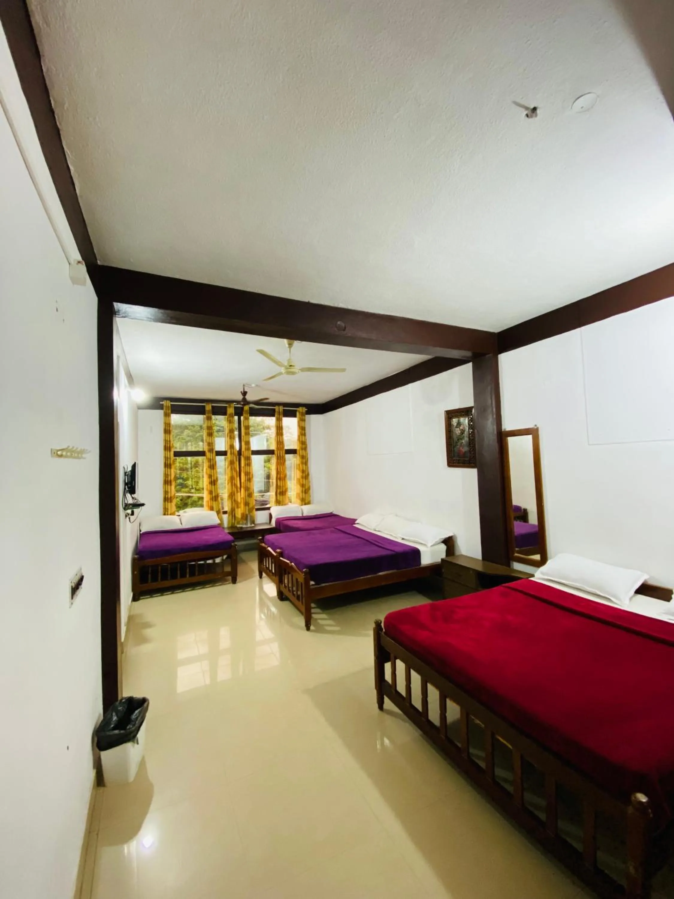 Bed in Hotel Caveri Inn