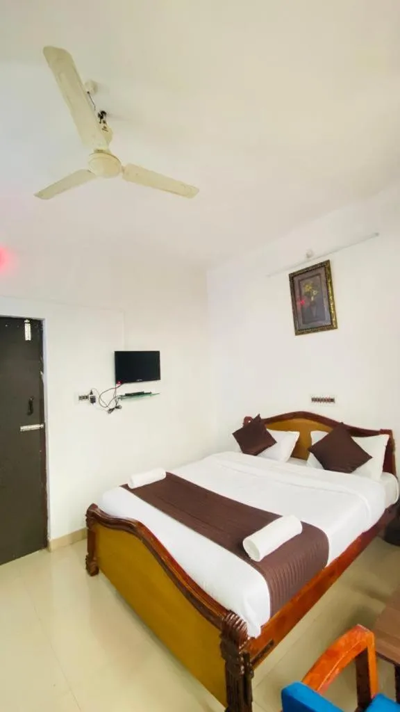 Bed in Hotel Caveri Inn