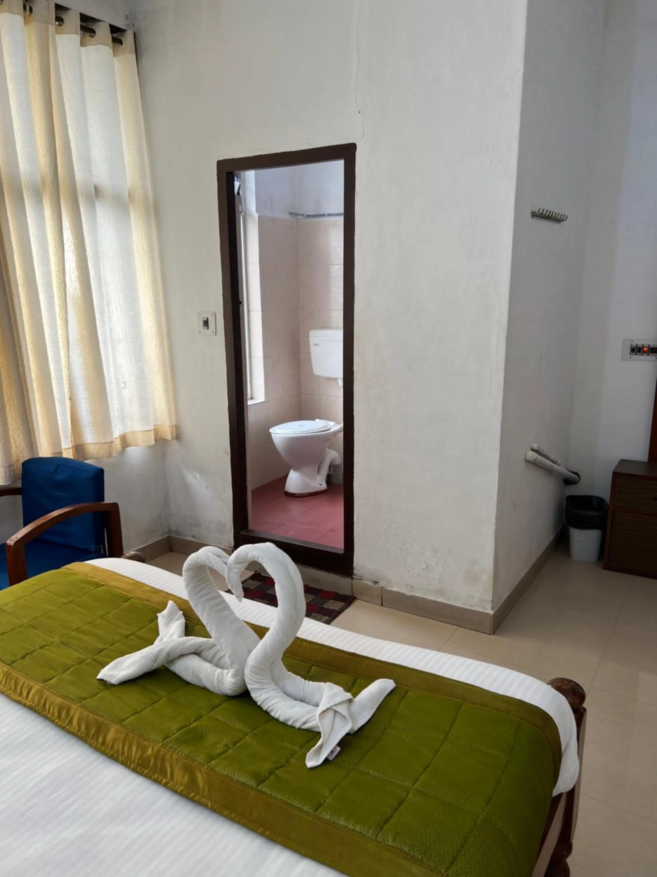 Bed in Hotel Caveri Inn