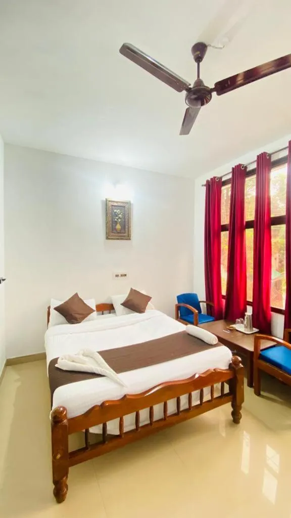 Bed in Hotel Caveri Inn