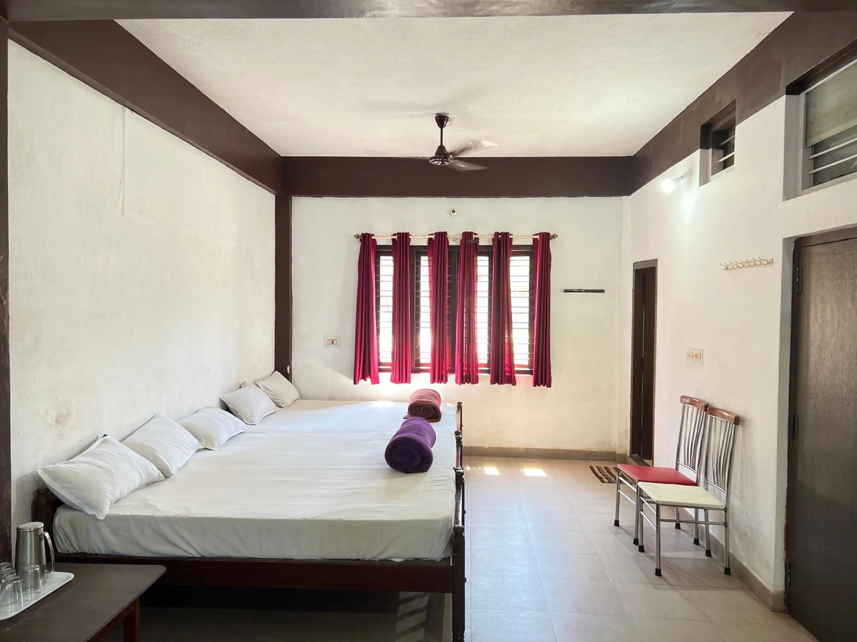 Bed in Hotel Caveri Inn