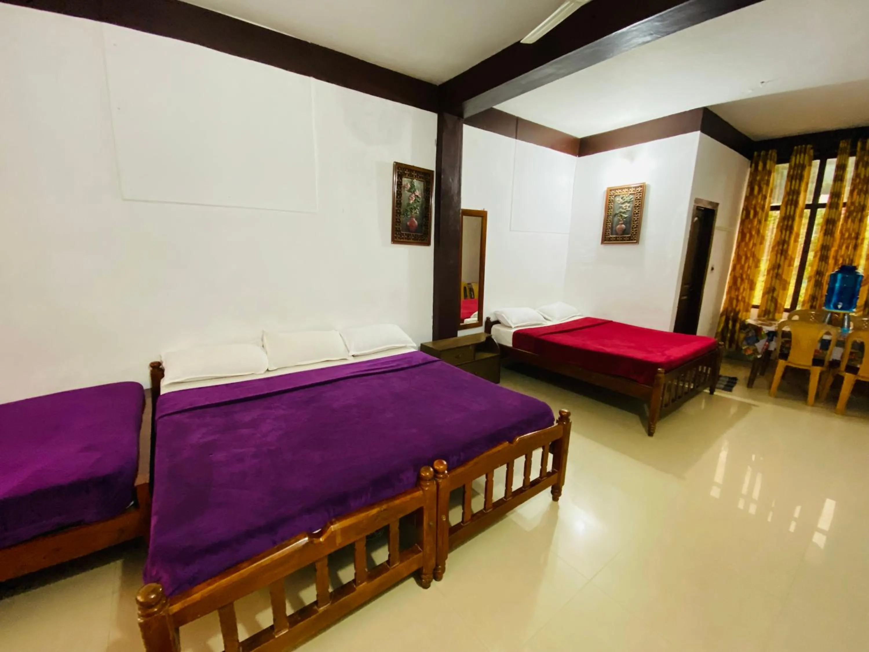 Bed in Hotel Caveri Inn