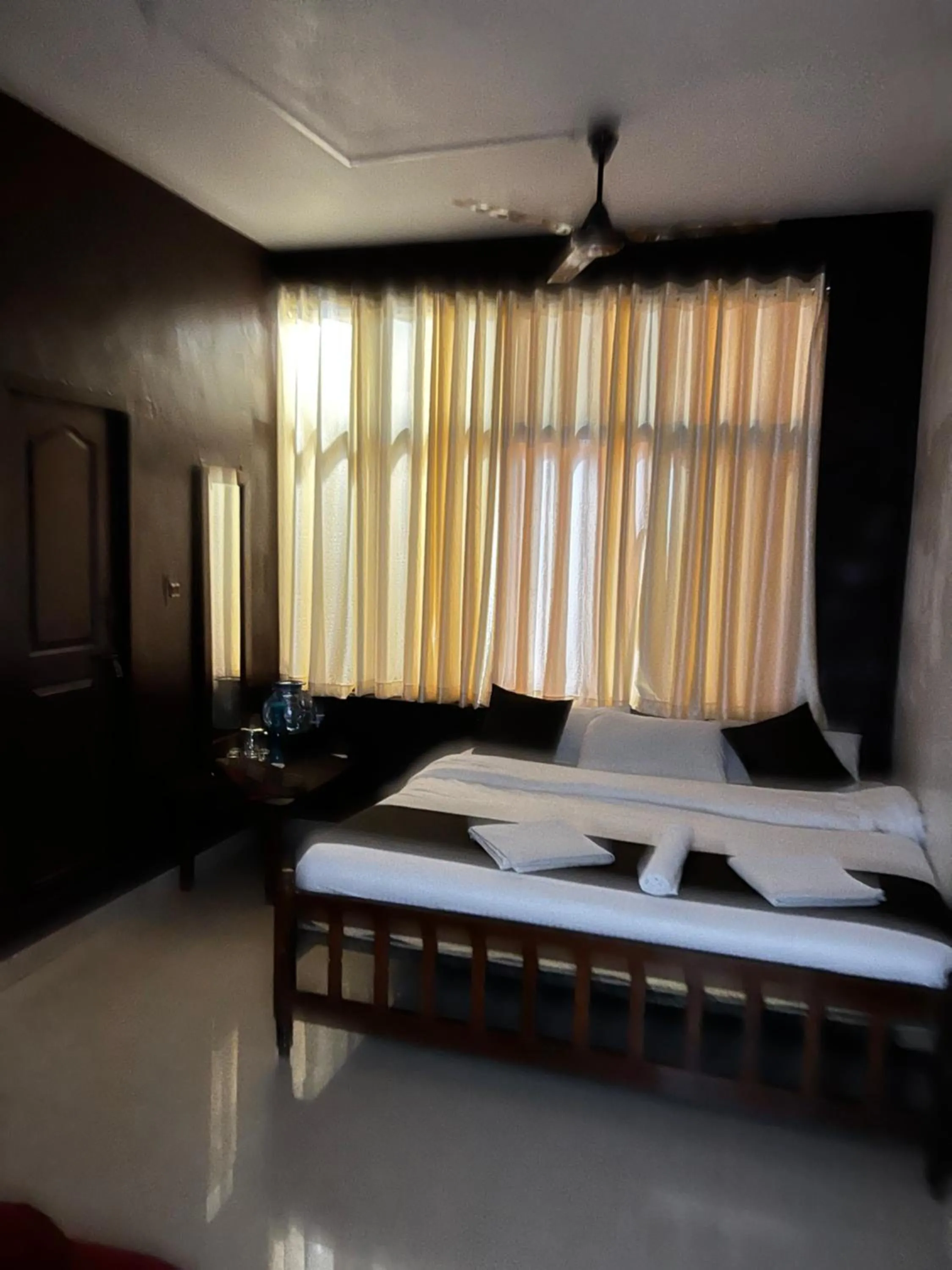 Bed in Hotel Caveri Inn
