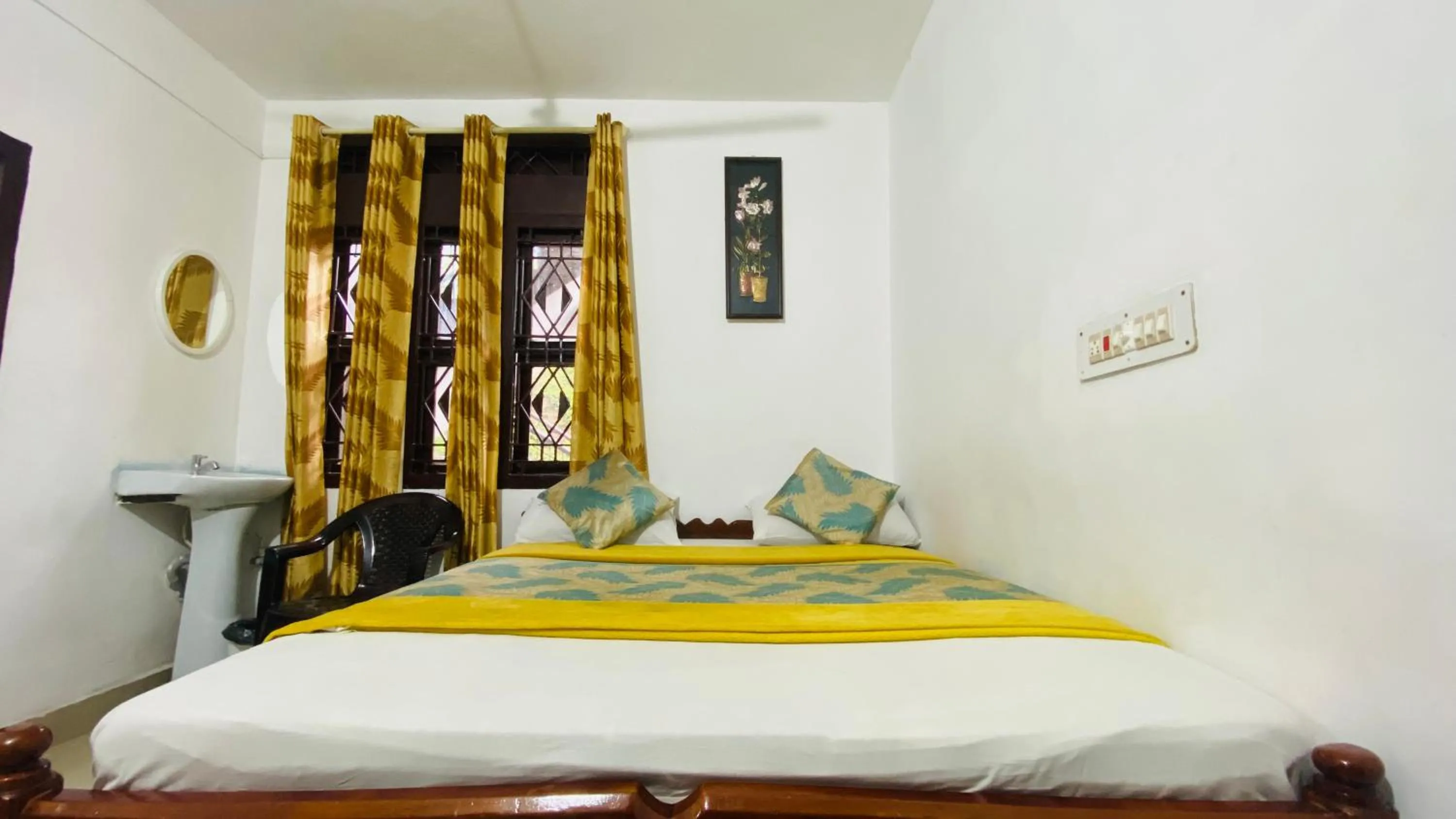 Bed in Hotel Caveri Inn