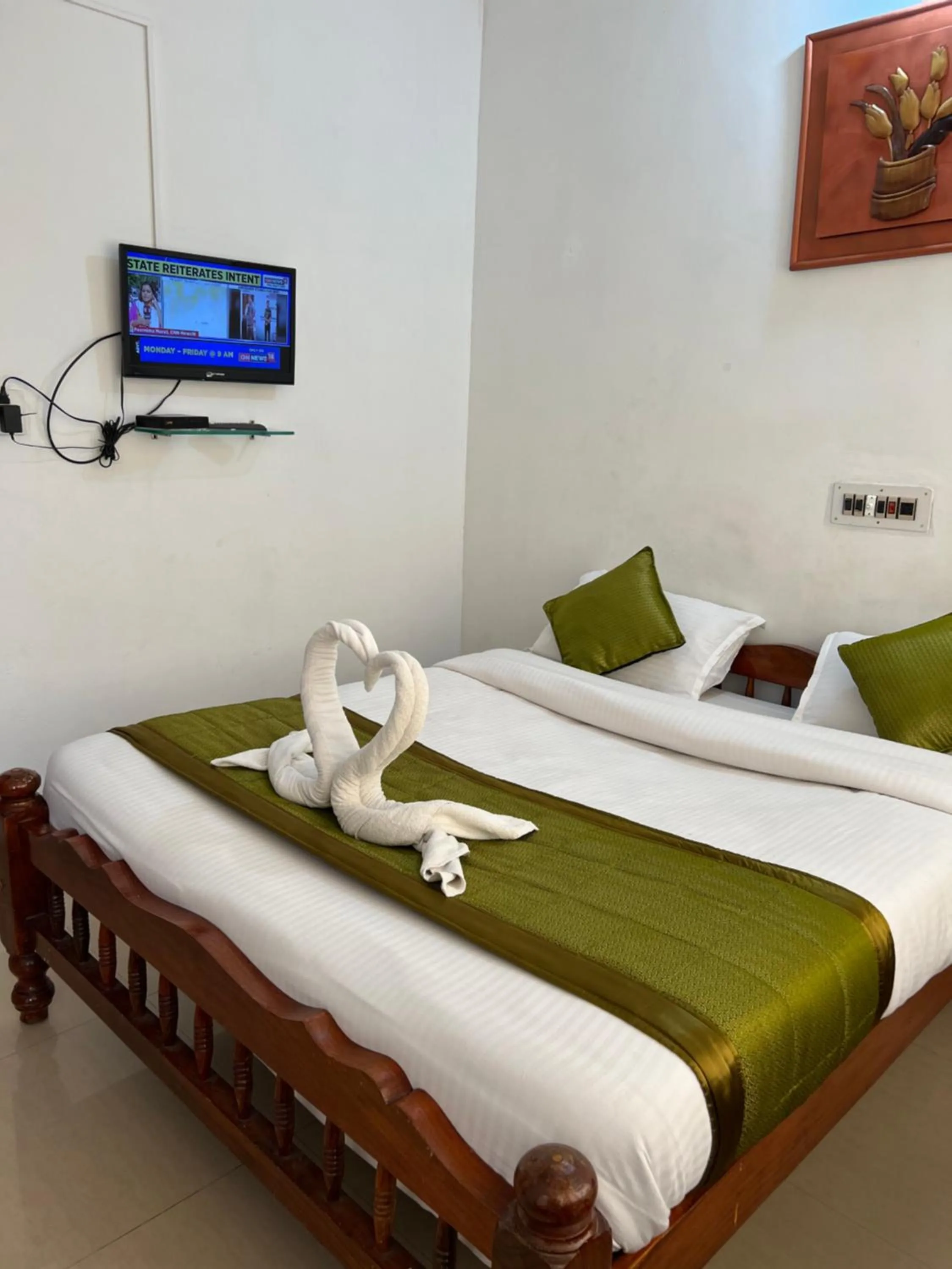 Bed in Hotel Caveri Inn